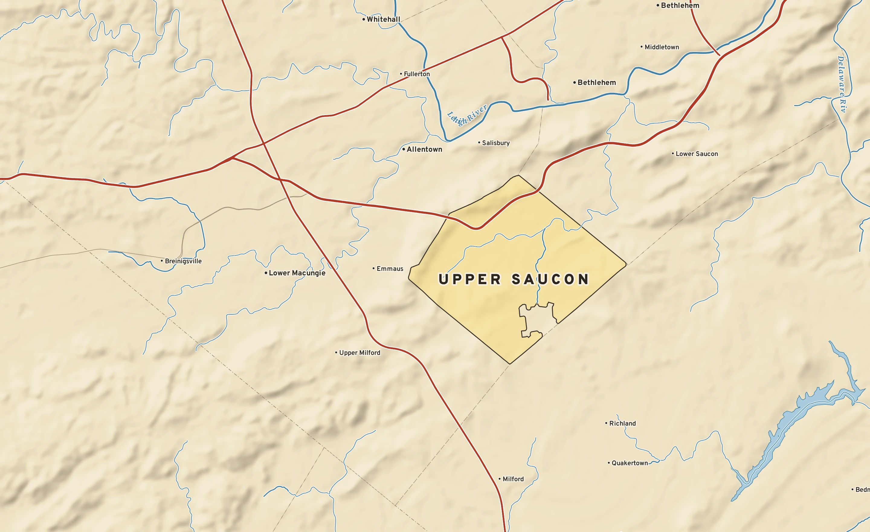 Shaded-relief atlas plate of Upper Saucon, Pennsylvania: rivers, roads, the city limits and where the water drains.
