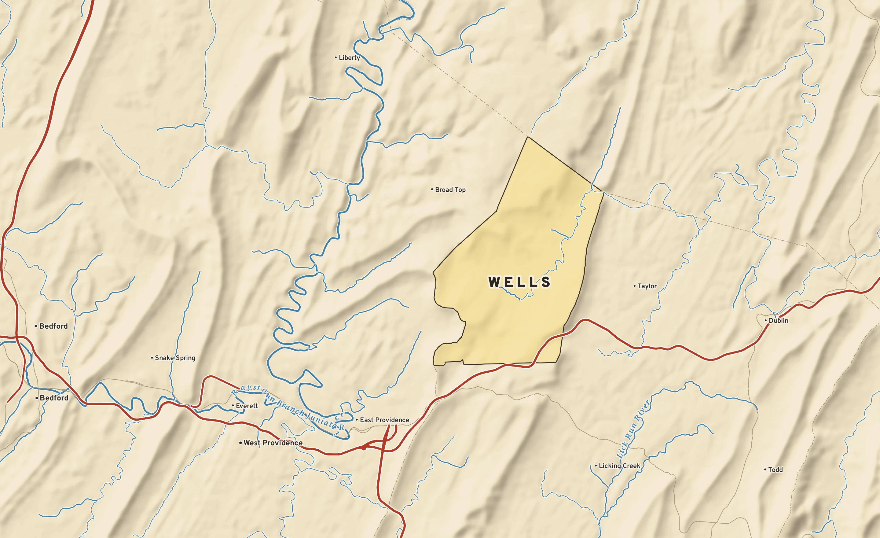Shaded-relief atlas plate of Wells, Pennsylvania: rivers, roads, the city limits and where the water drains.