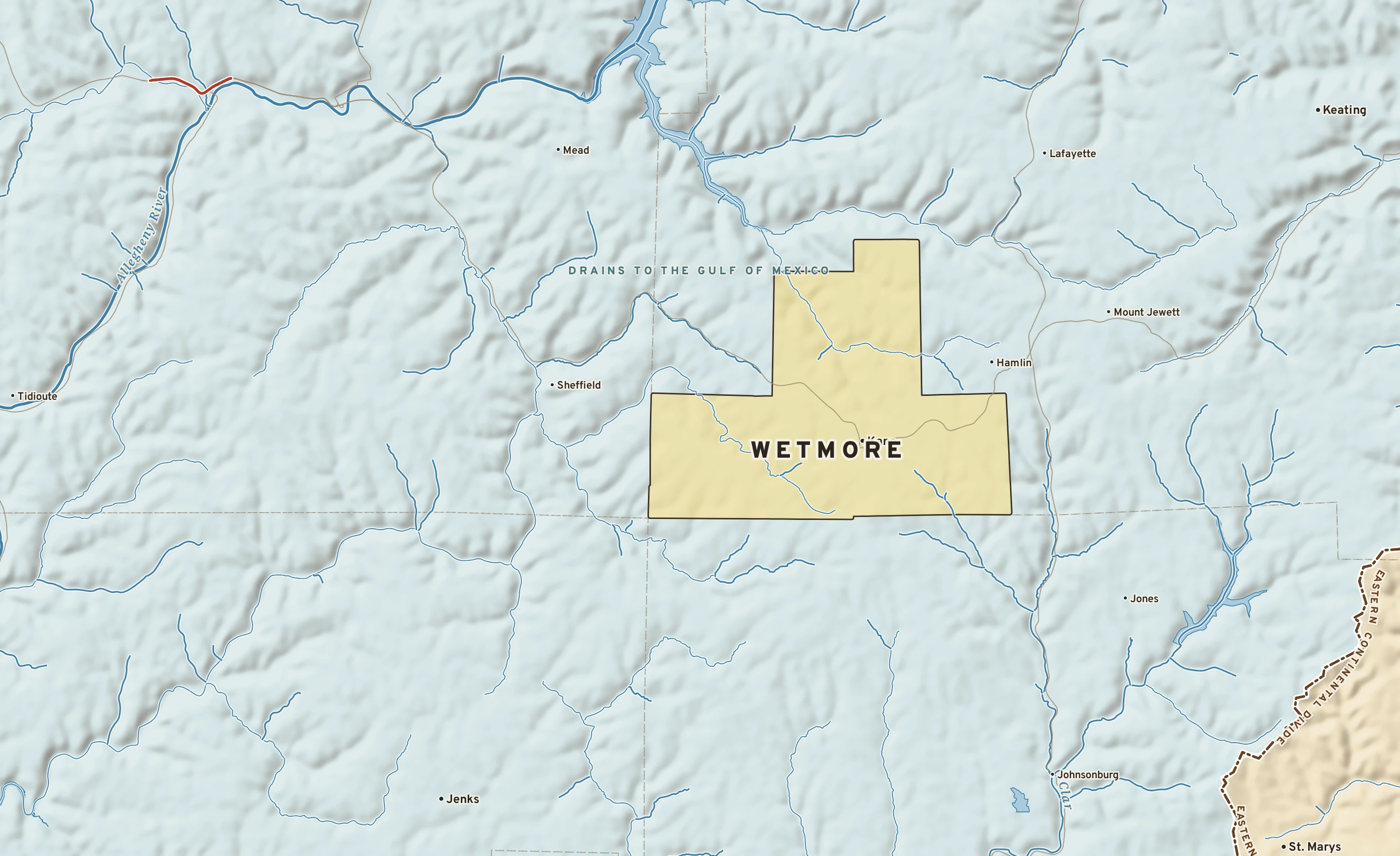 Shaded-relief atlas plate of Wetmore, Pennsylvania: rivers, roads, the city limits and where the water drains.
