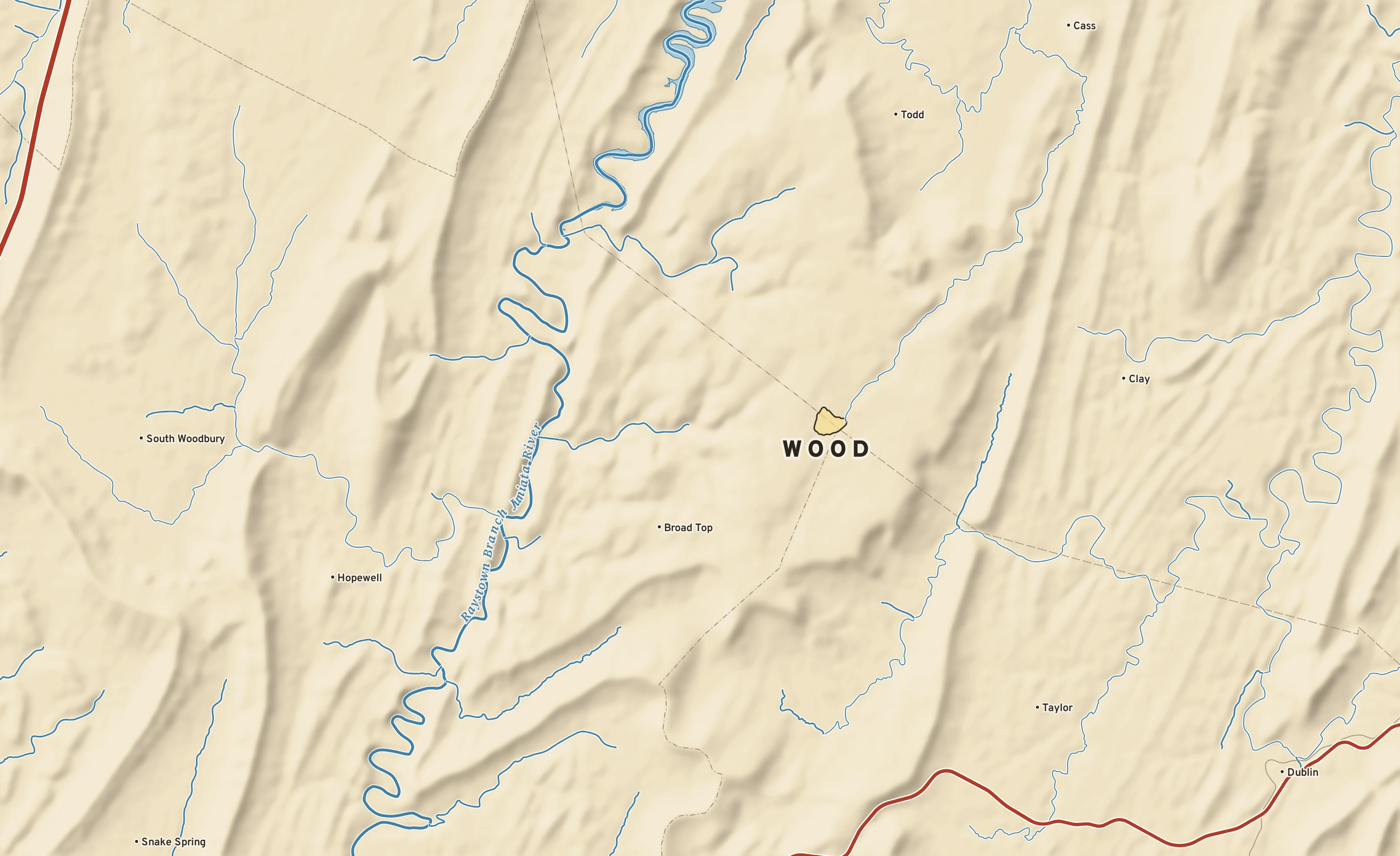Shaded-relief atlas plate of Wood, Pennsylvania: rivers, roads, the city limits and where the water drains.