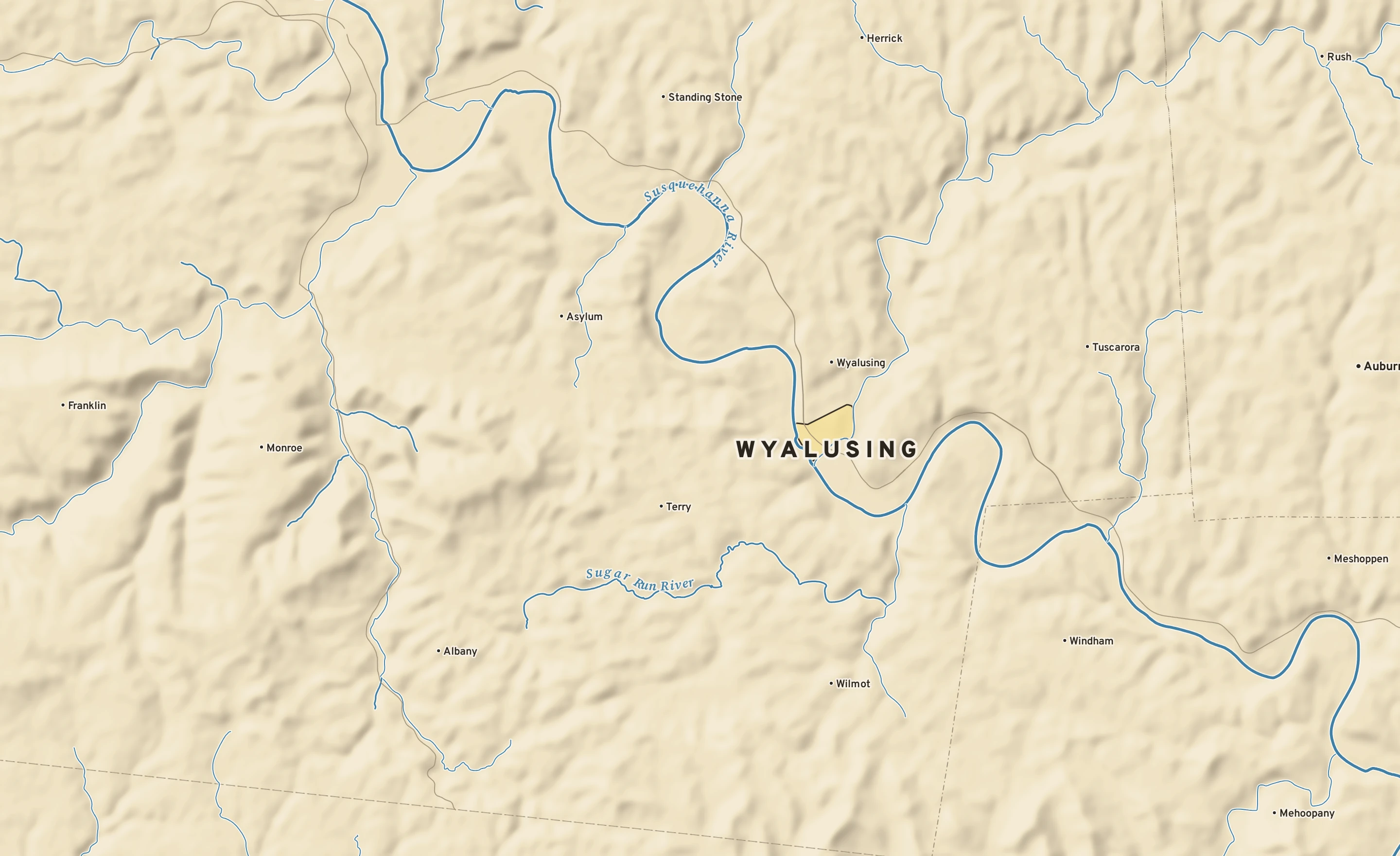 Shaded-relief atlas plate of Wyalusing, Pennsylvania: rivers, roads, the city limits and where the water drains.