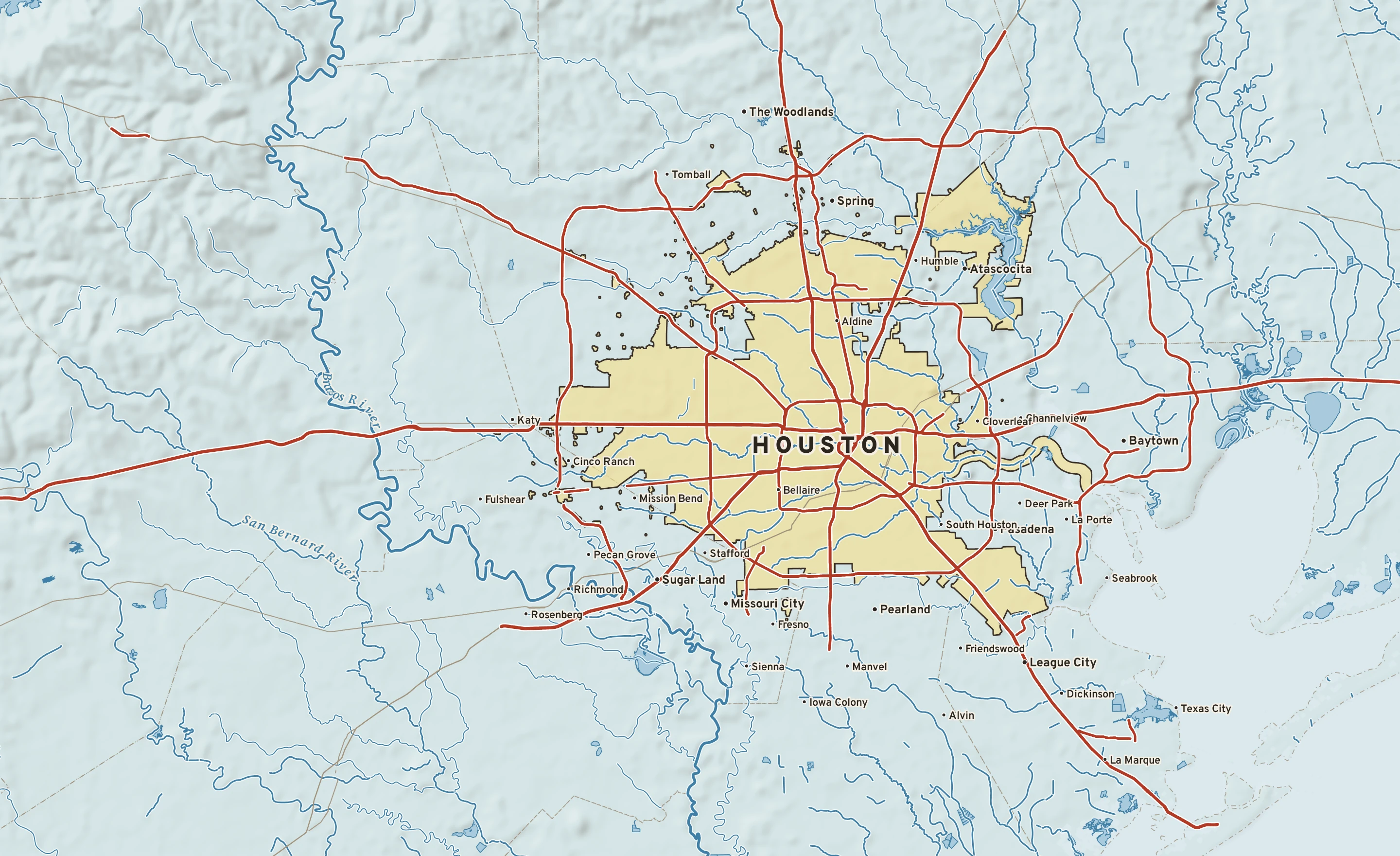 Shaded-relief atlas plate of Houston, Texas: rivers, roads, the city limits and where the water drains.