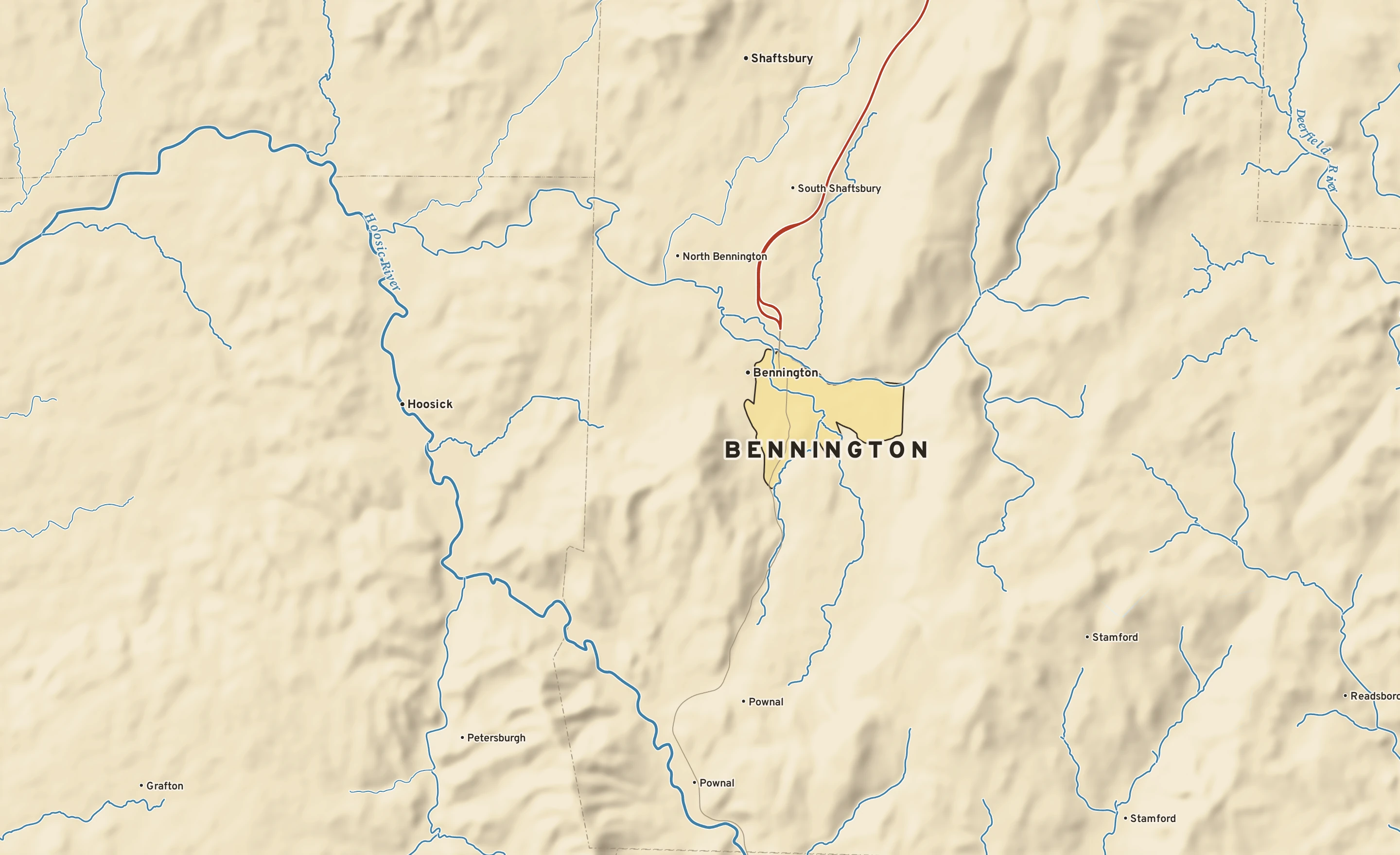 Shaded-relief atlas plate of Bennington, Vermont: rivers, roads, the city limits and where the water drains.
