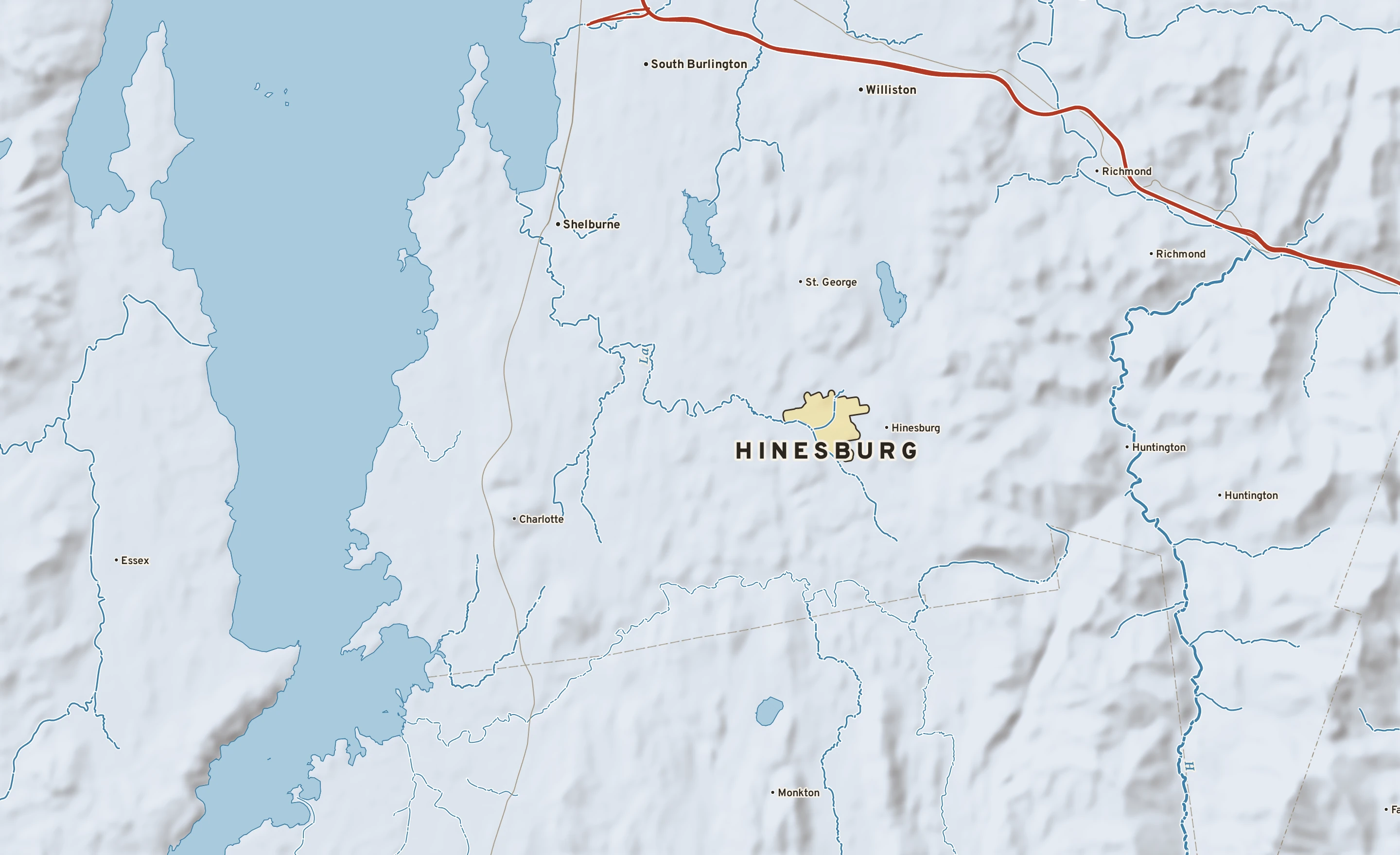 Shaded-relief atlas plate of Hinesburg, Vermont: rivers, roads, the city limits and where the water drains.