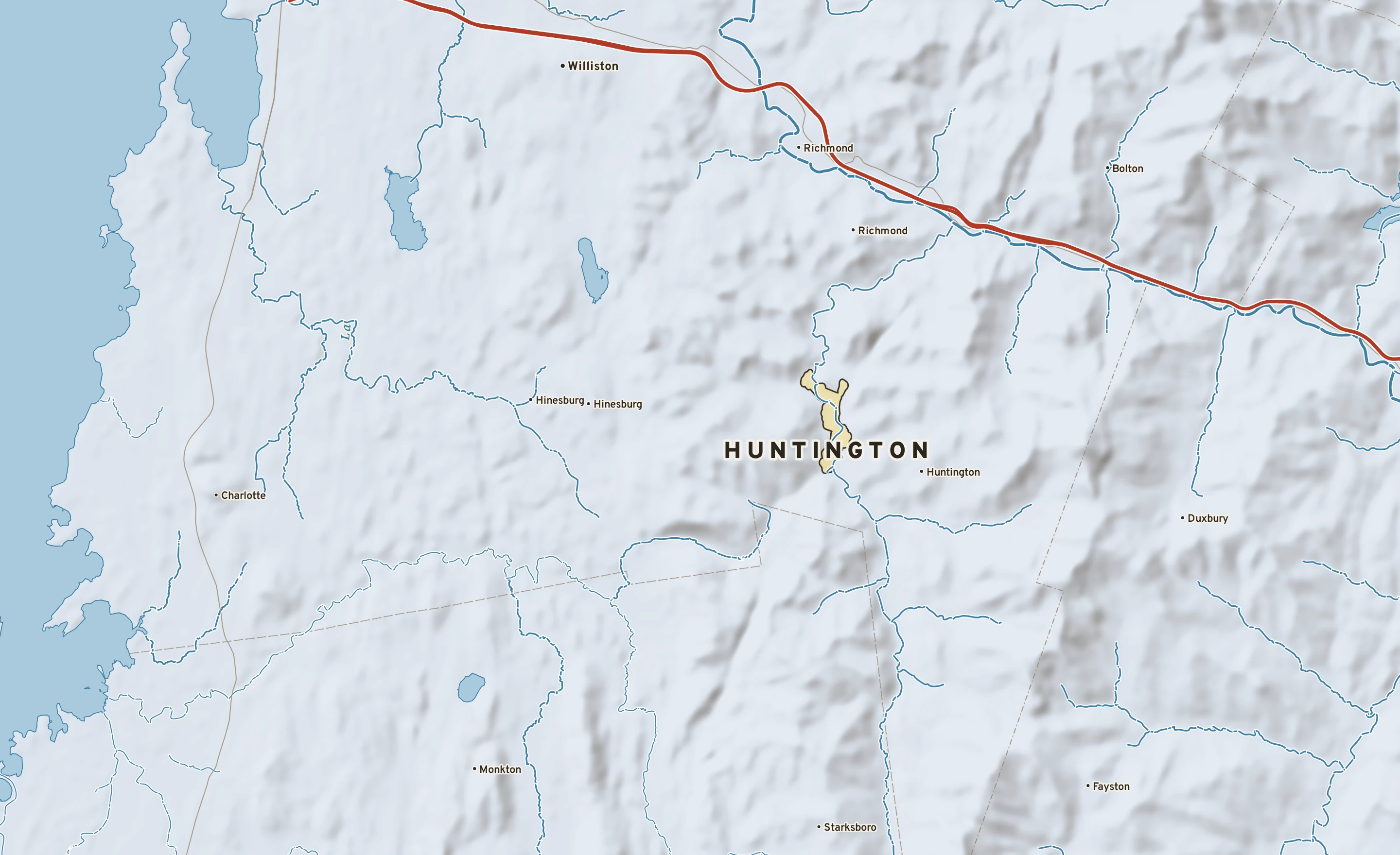Shaded-relief atlas plate of Huntington, Vermont: rivers, roads, the city limits and where the water drains.