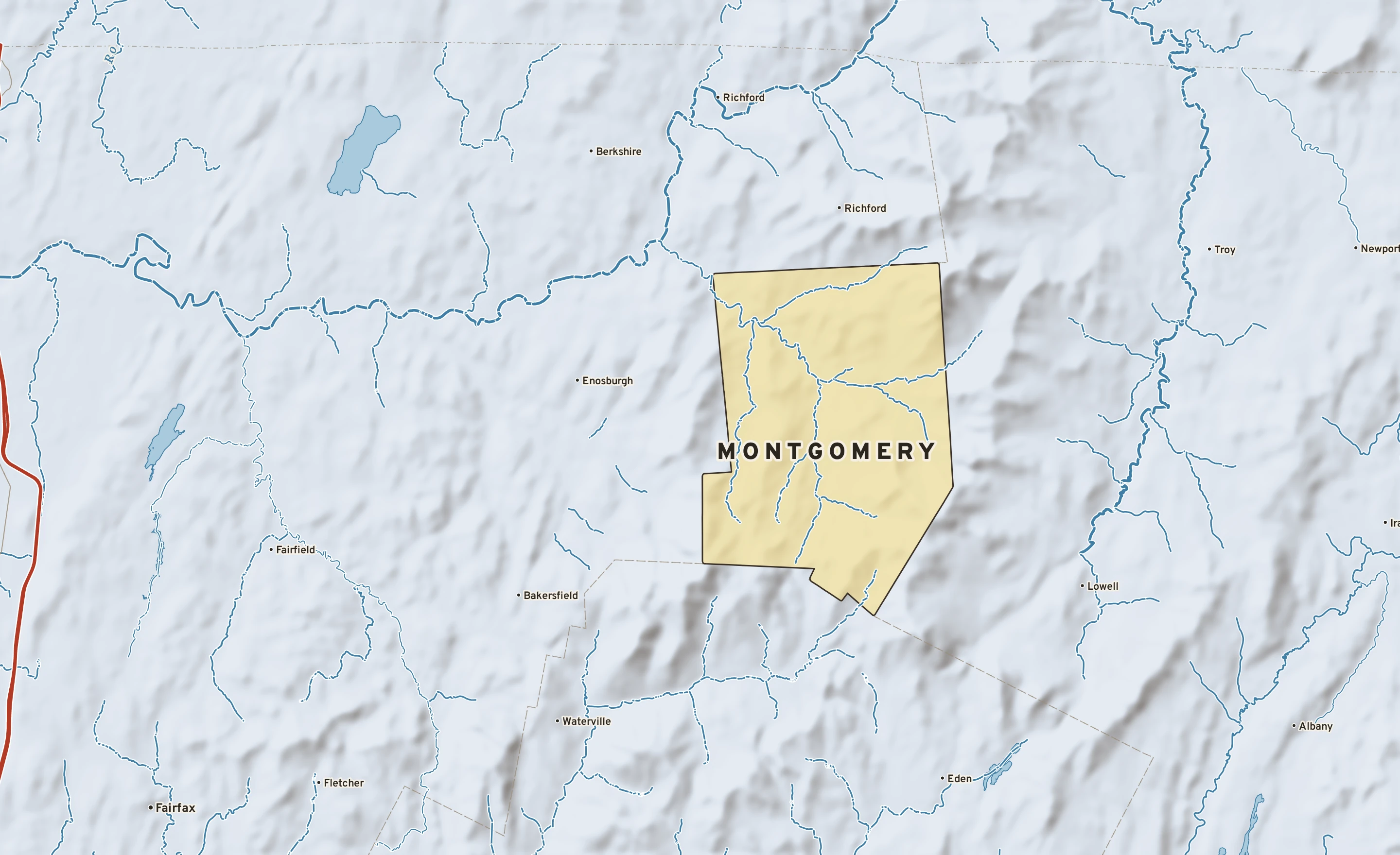 Shaded-relief atlas plate of Montgomery, Vermont: rivers, roads, the city limits and where the water drains.