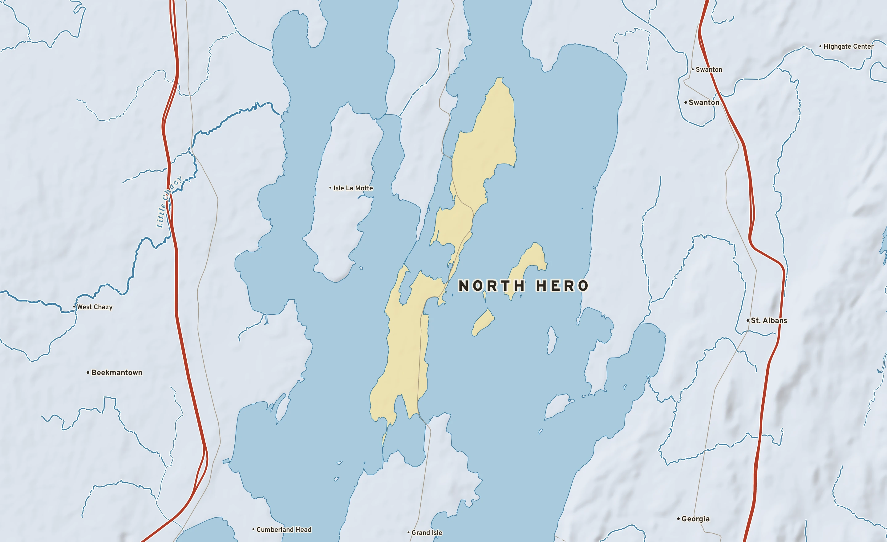 Shaded-relief atlas plate of North Hero, Vermont: rivers, roads, the city limits and where the water drains.