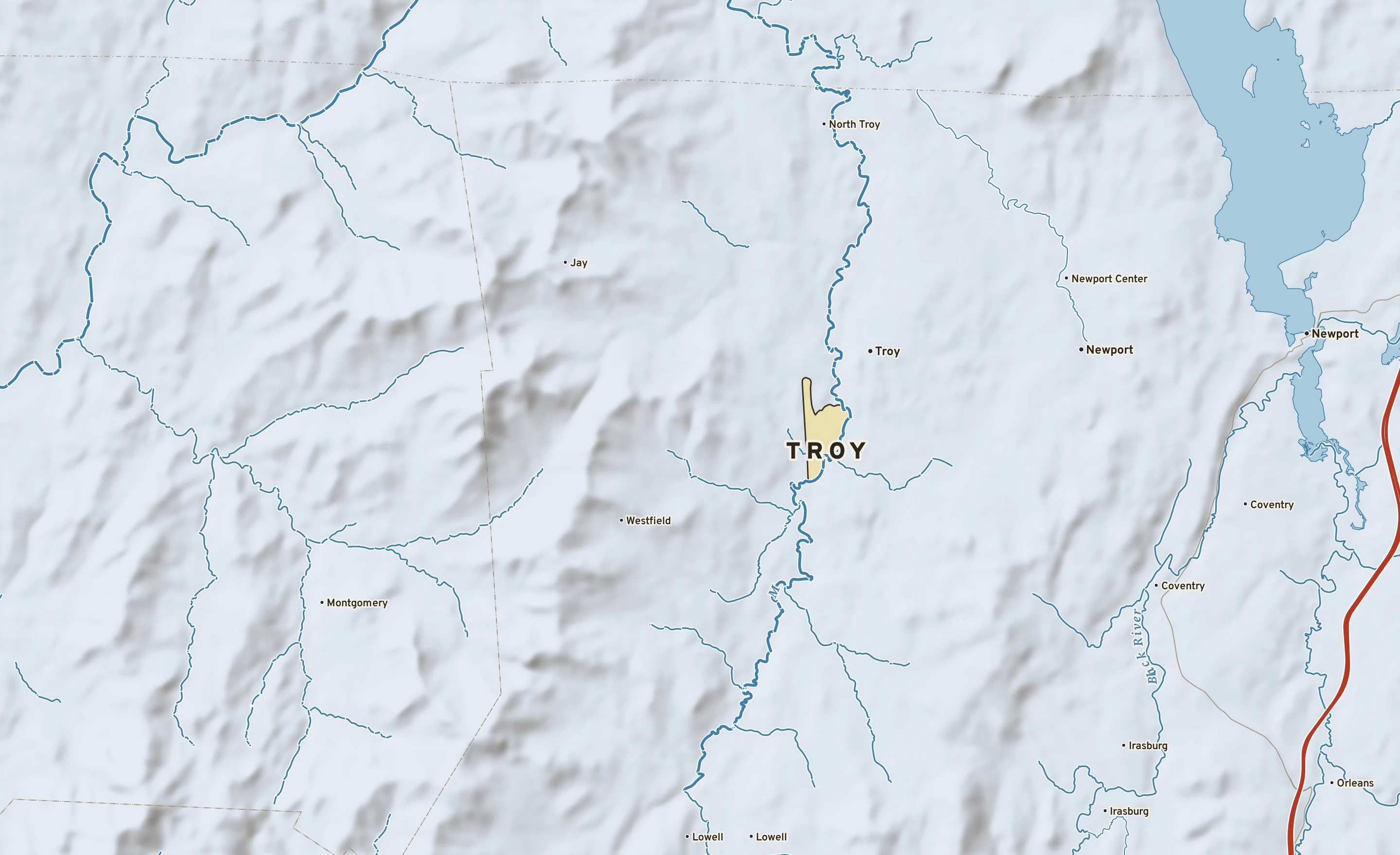 Shaded-relief atlas plate of Troy, Vermont: rivers, roads, the city limits and where the water drains.