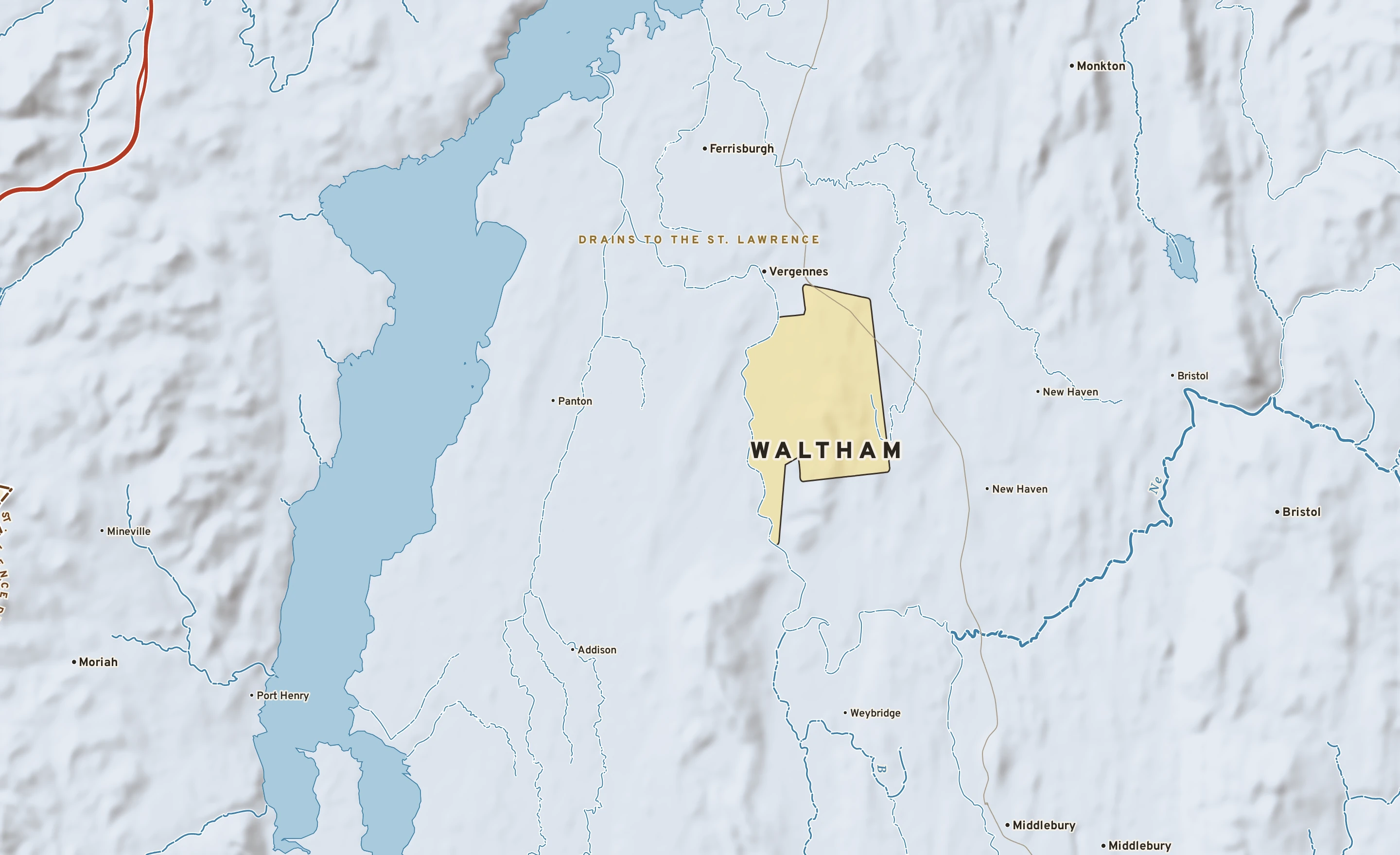Shaded-relief atlas plate of Waltham, Vermont: rivers, roads, the city limits and where the water drains.