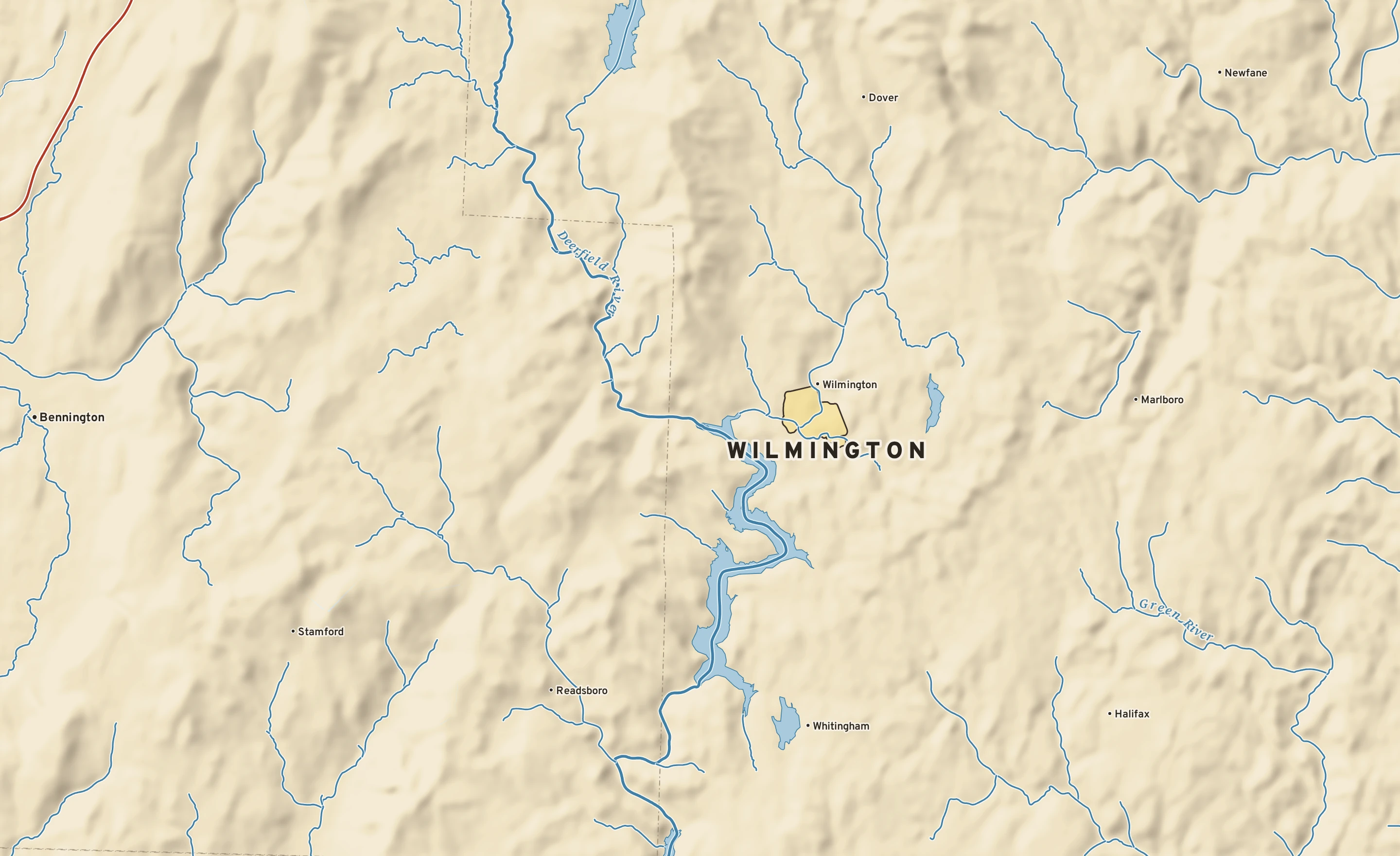 Shaded-relief atlas plate of Wilmington, Vermont: rivers, roads, the city limits and where the water drains.