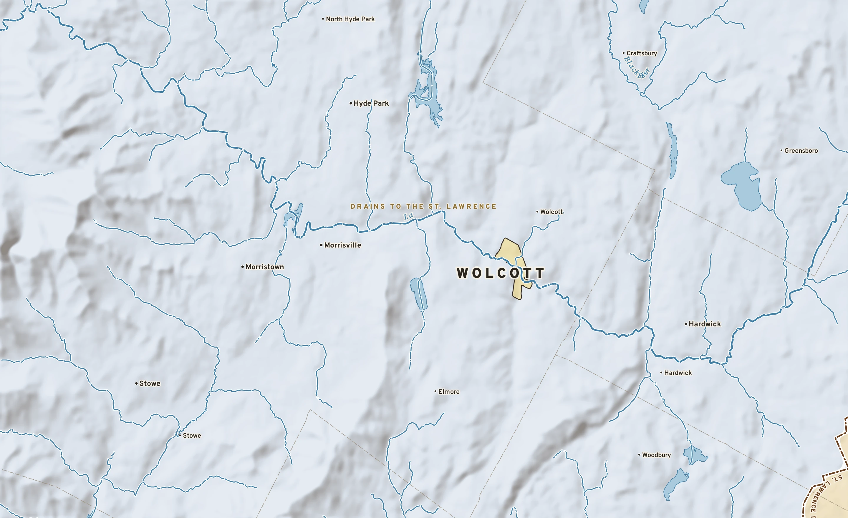 Shaded-relief atlas plate of Wolcott, Vermont: rivers, roads, the city limits and where the water drains.