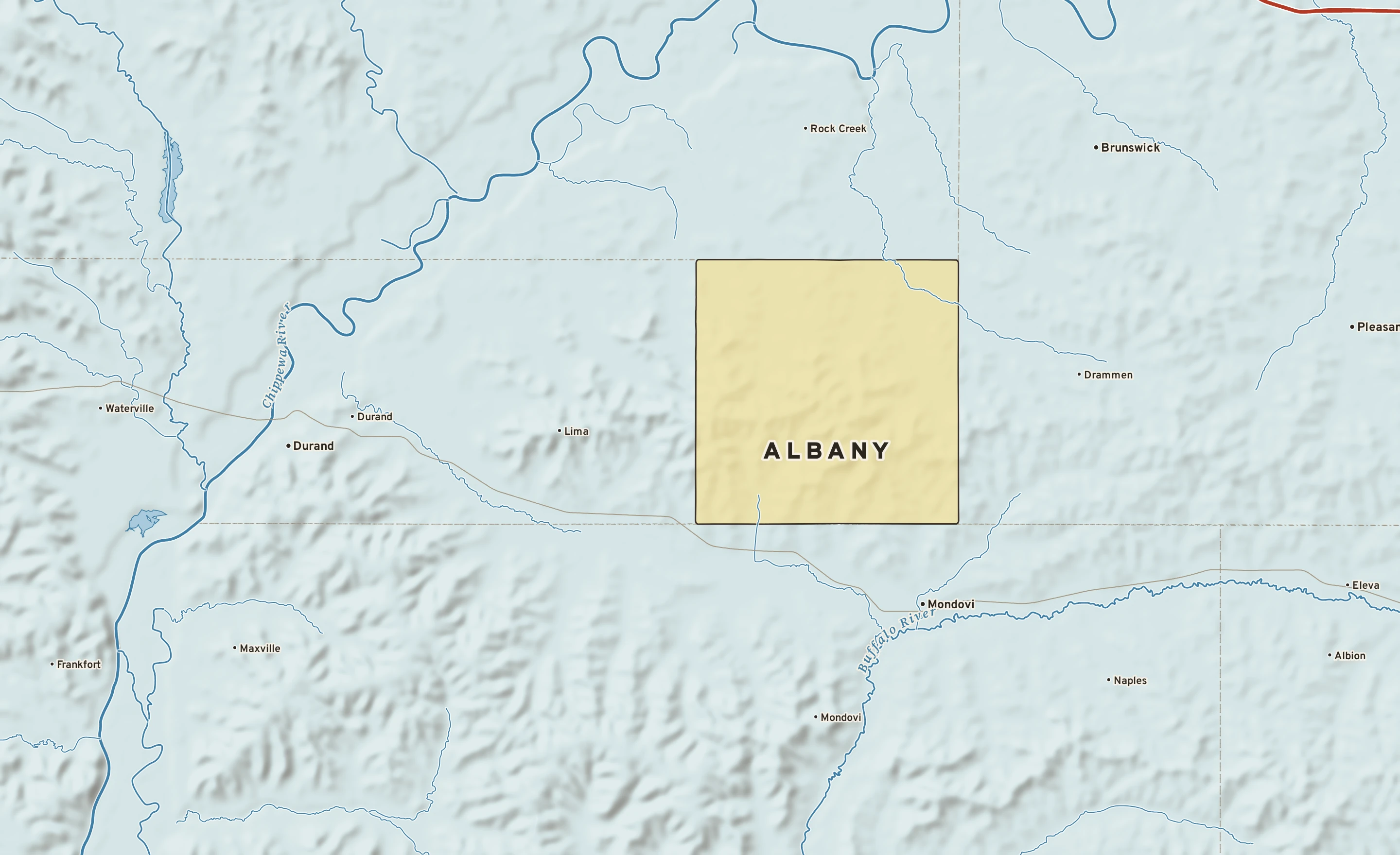 Shaded-relief atlas plate of Albany, Wisconsin: rivers, roads, the city limits and where the water drains.