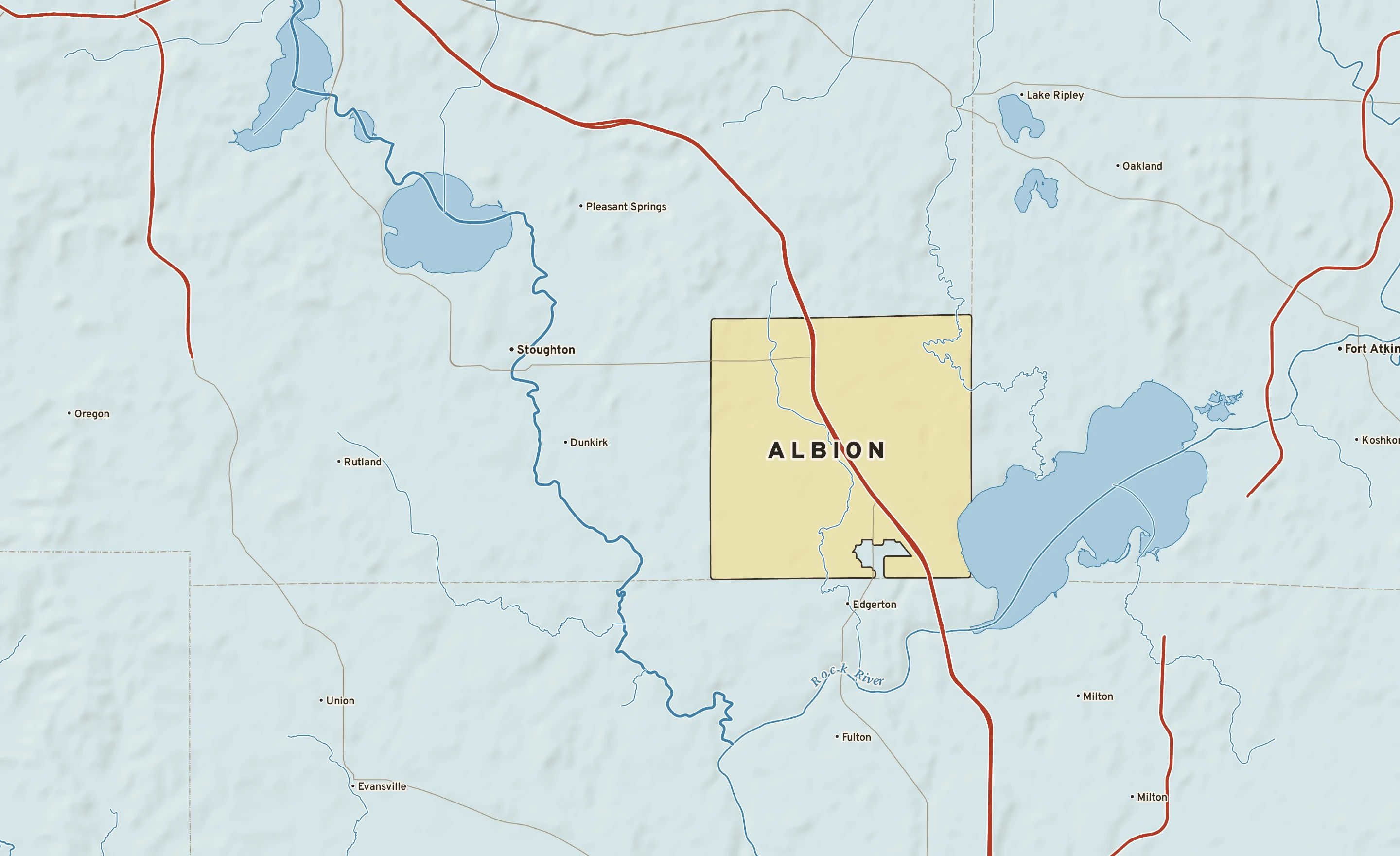 Shaded-relief atlas plate of Albion, Wisconsin: rivers, roads, the city limits and where the water drains.