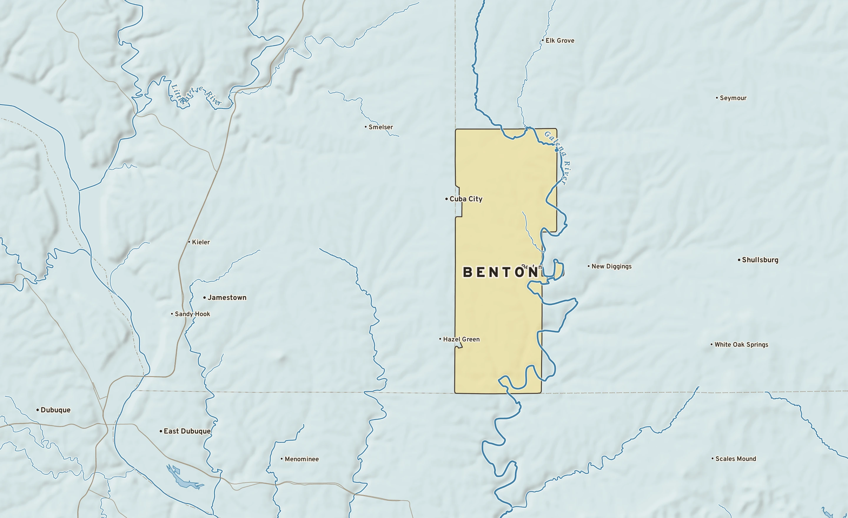 Shaded-relief atlas plate of Benton, Wisconsin: rivers, roads, the city limits and where the water drains.