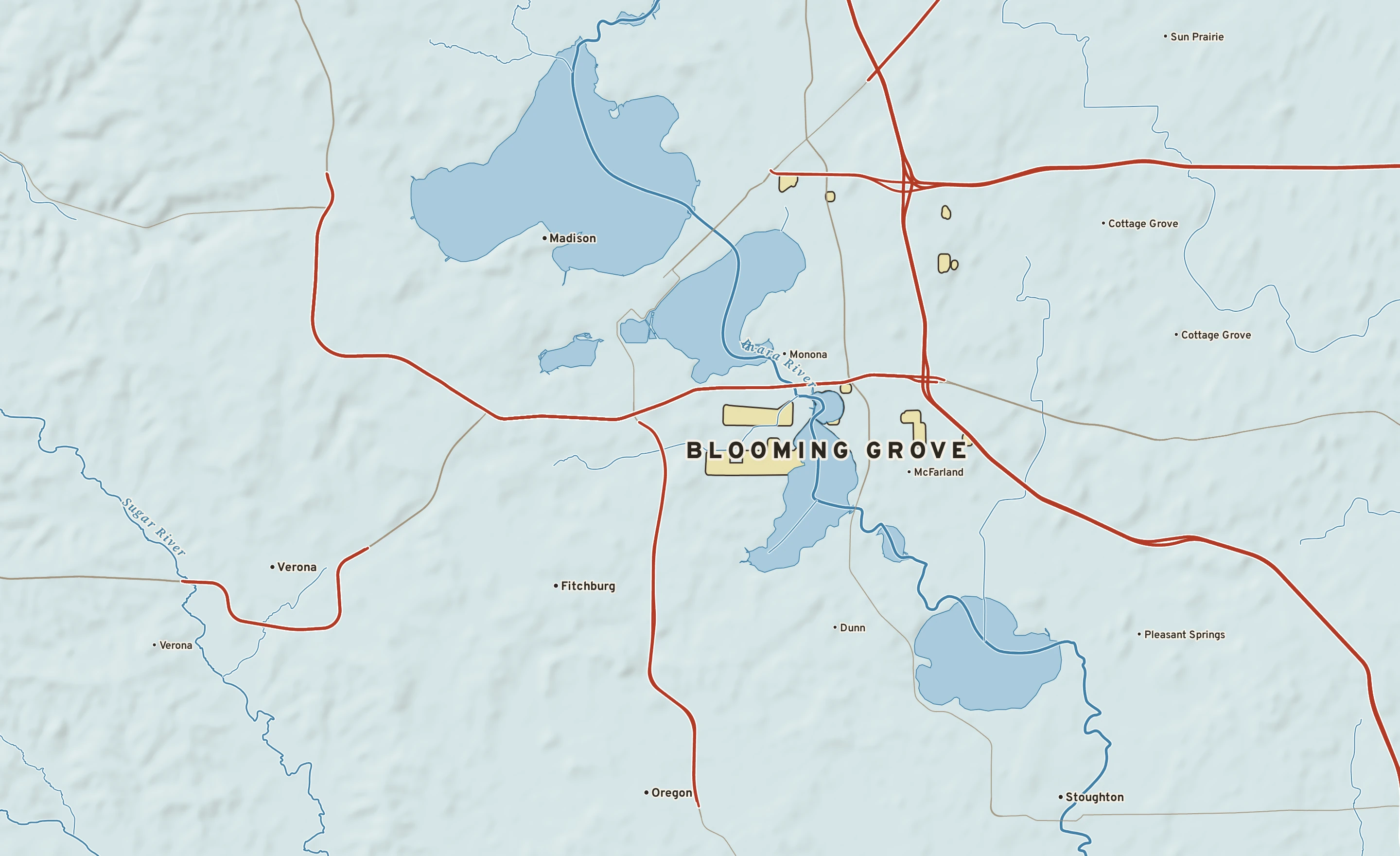 Shaded-relief atlas plate of Blooming Grove, Wisconsin: rivers, roads, the city limits and where the water drains.