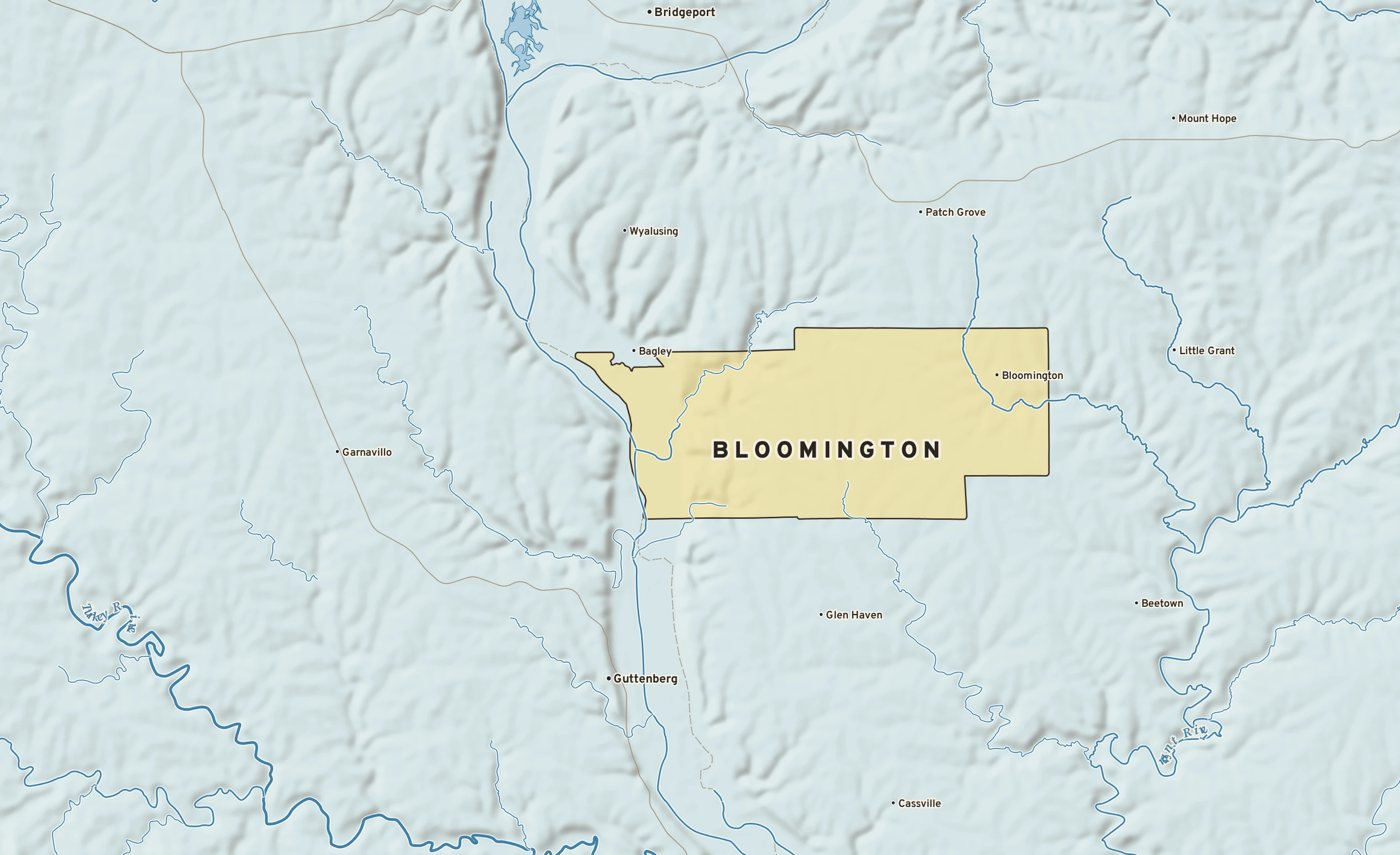 Shaded-relief atlas plate of Bloomington, Wisconsin: rivers, roads, the city limits and where the water drains.
