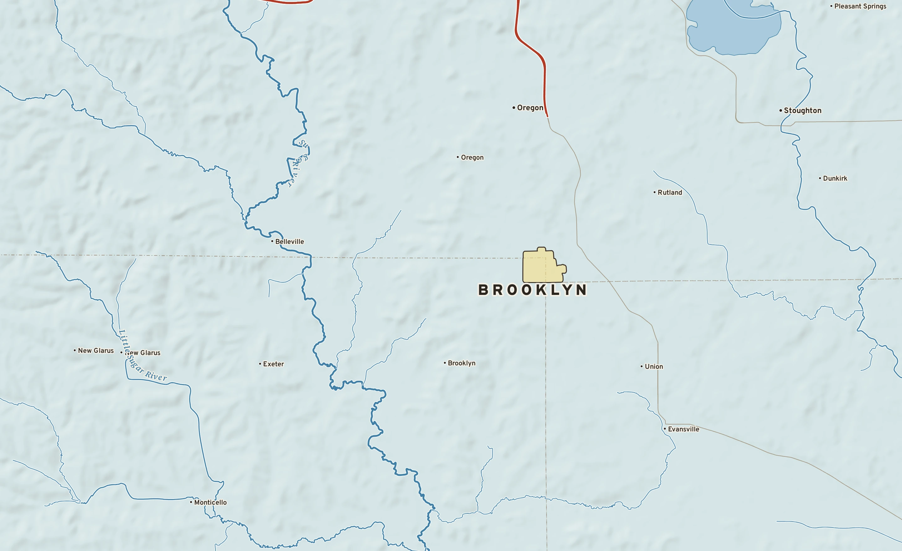 Shaded-relief atlas plate of Brooklyn, Wisconsin: rivers, roads, the city limits and where the water drains.