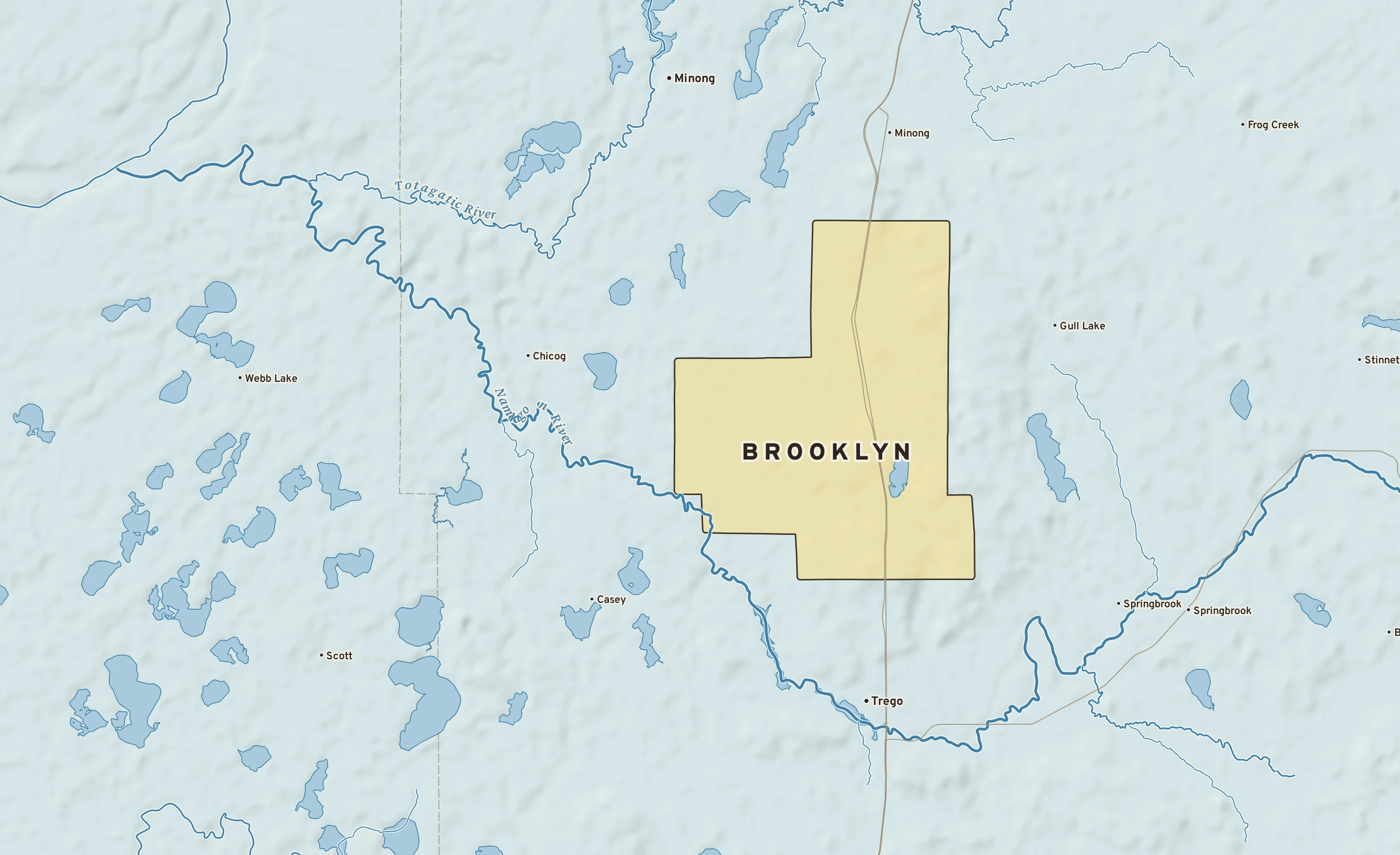Shaded-relief atlas plate of Brooklyn, Wisconsin: rivers, roads, the city limits and where the water drains.
