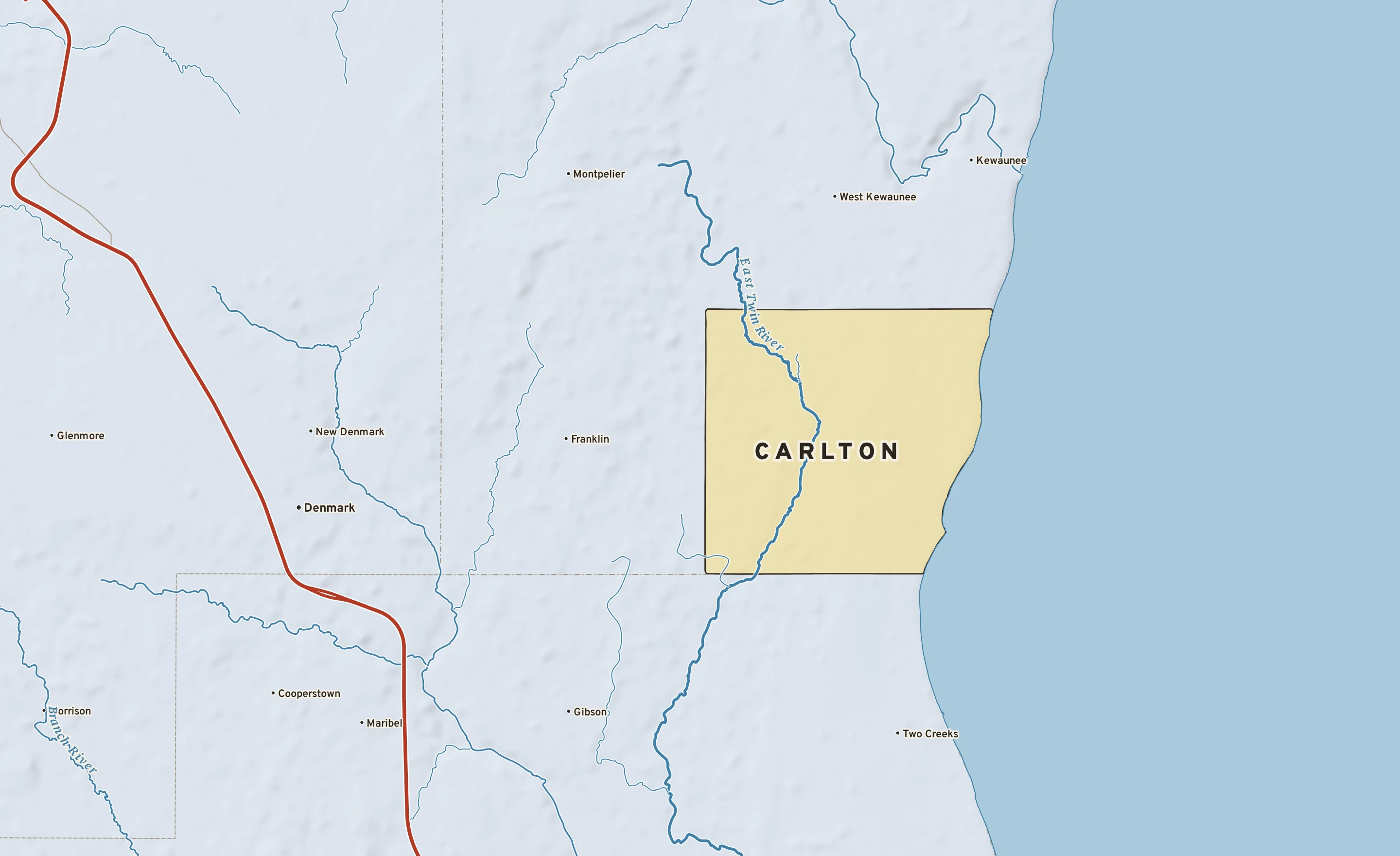 Shaded-relief atlas plate of Carlton, Wisconsin: rivers, roads, the city limits and where the water drains.