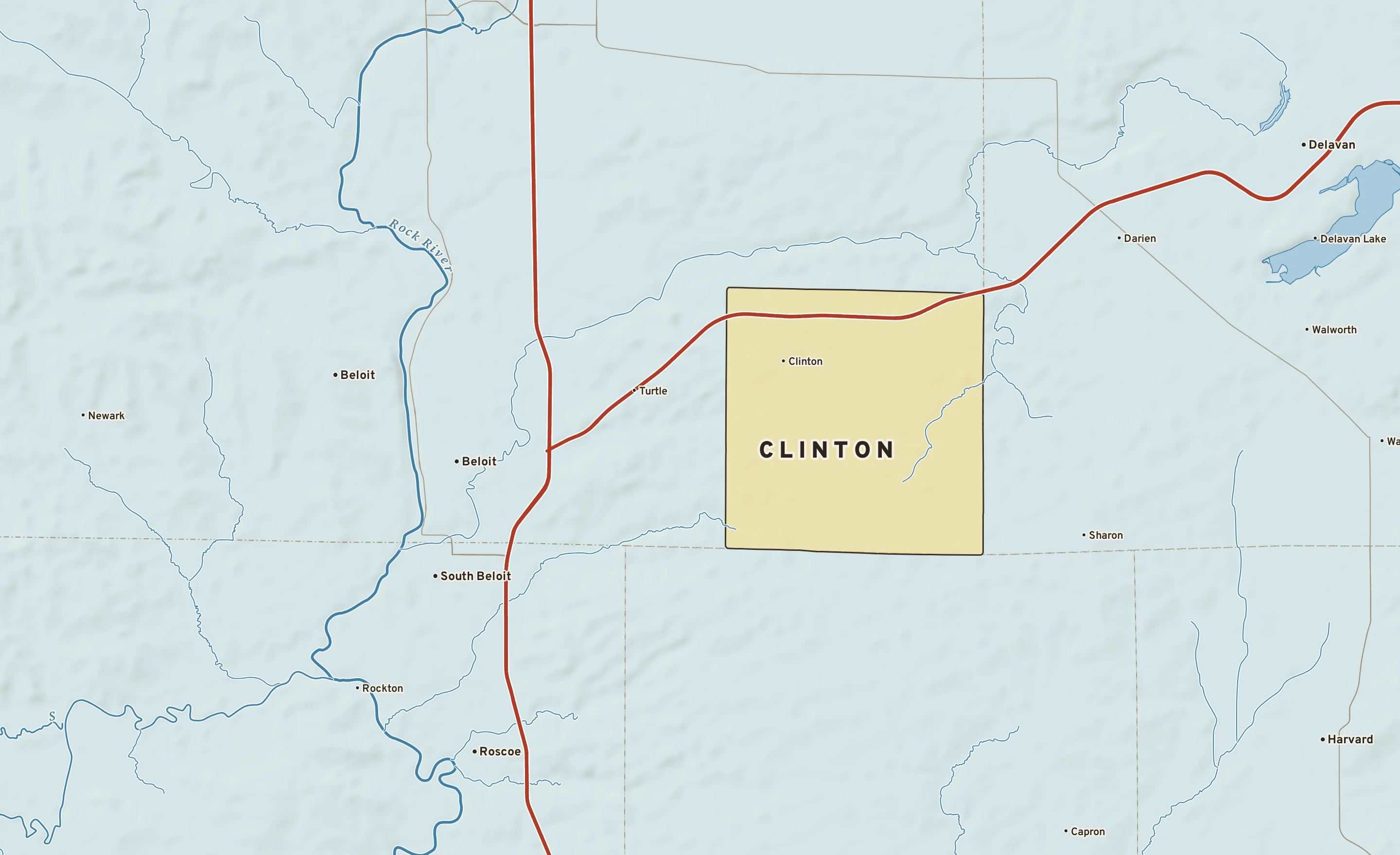Shaded-relief atlas plate of Clinton, Wisconsin: rivers, roads, the city limits and where the water drains.