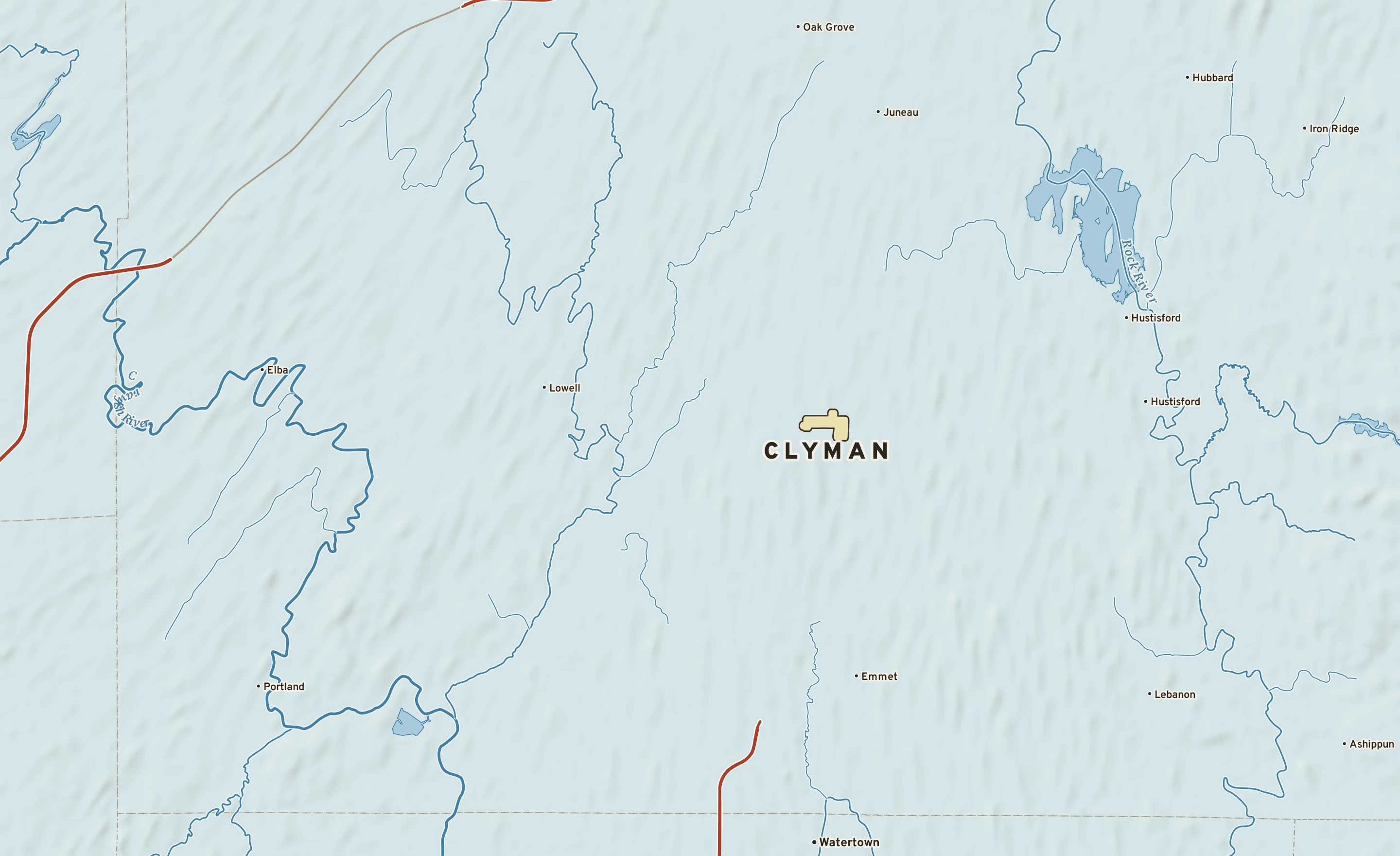 Shaded-relief atlas plate of Clyman, Wisconsin: rivers, roads, the city limits and where the water drains.