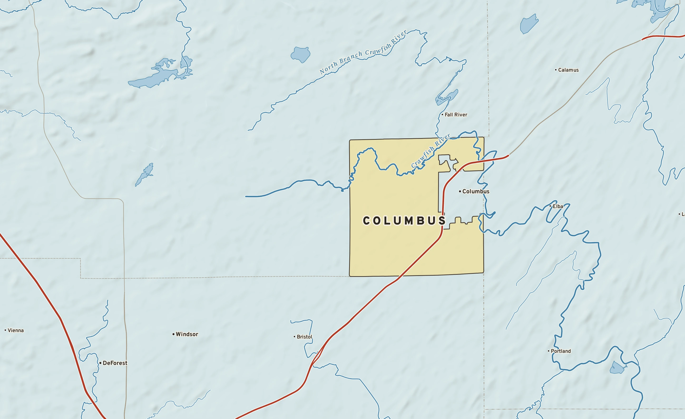 Shaded-relief atlas plate of Columbus, Wisconsin: rivers, roads, the city limits and where the water drains.