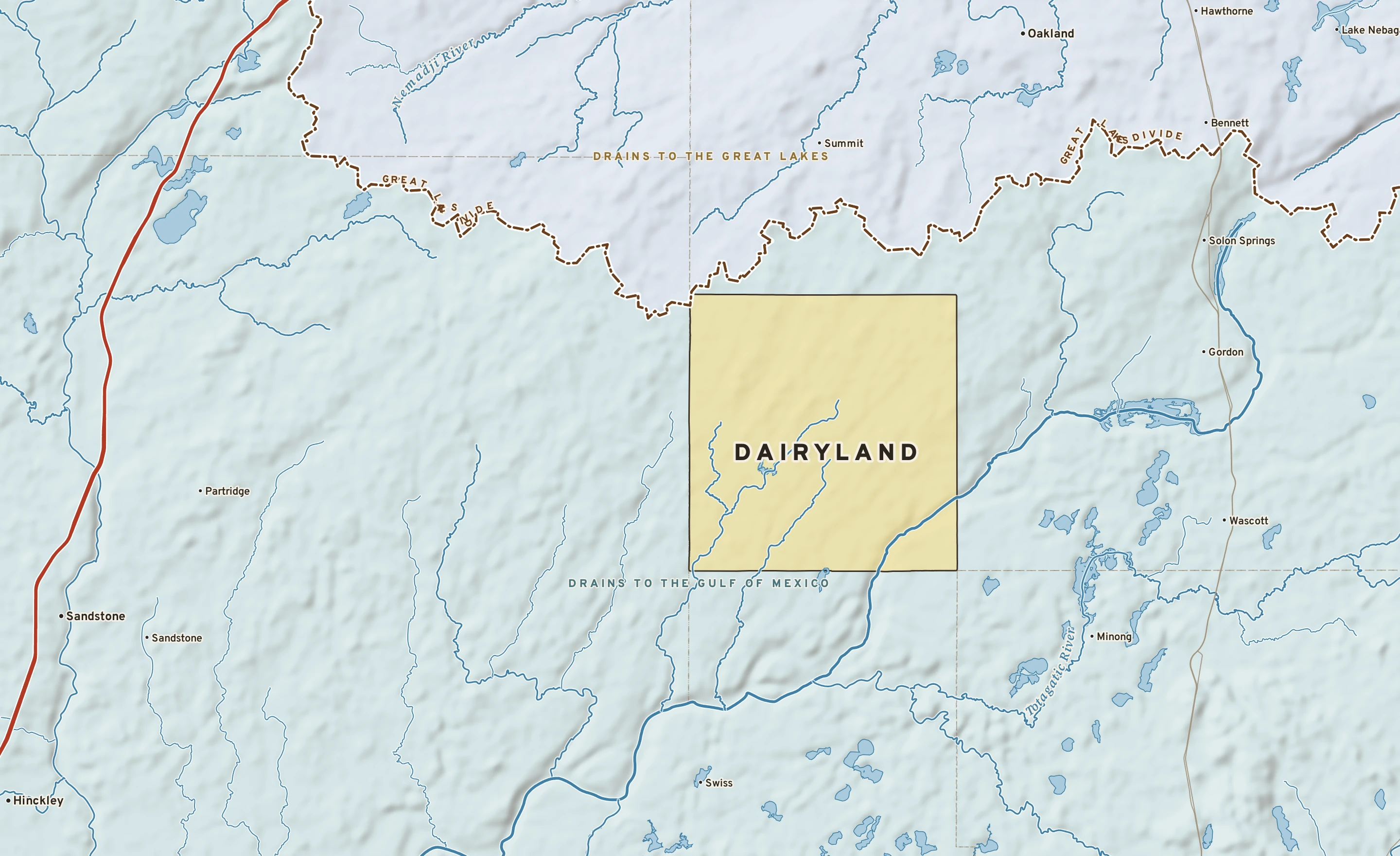 Shaded-relief atlas plate of Dairyland, Wisconsin: rivers, roads, the city limits and where the water drains.