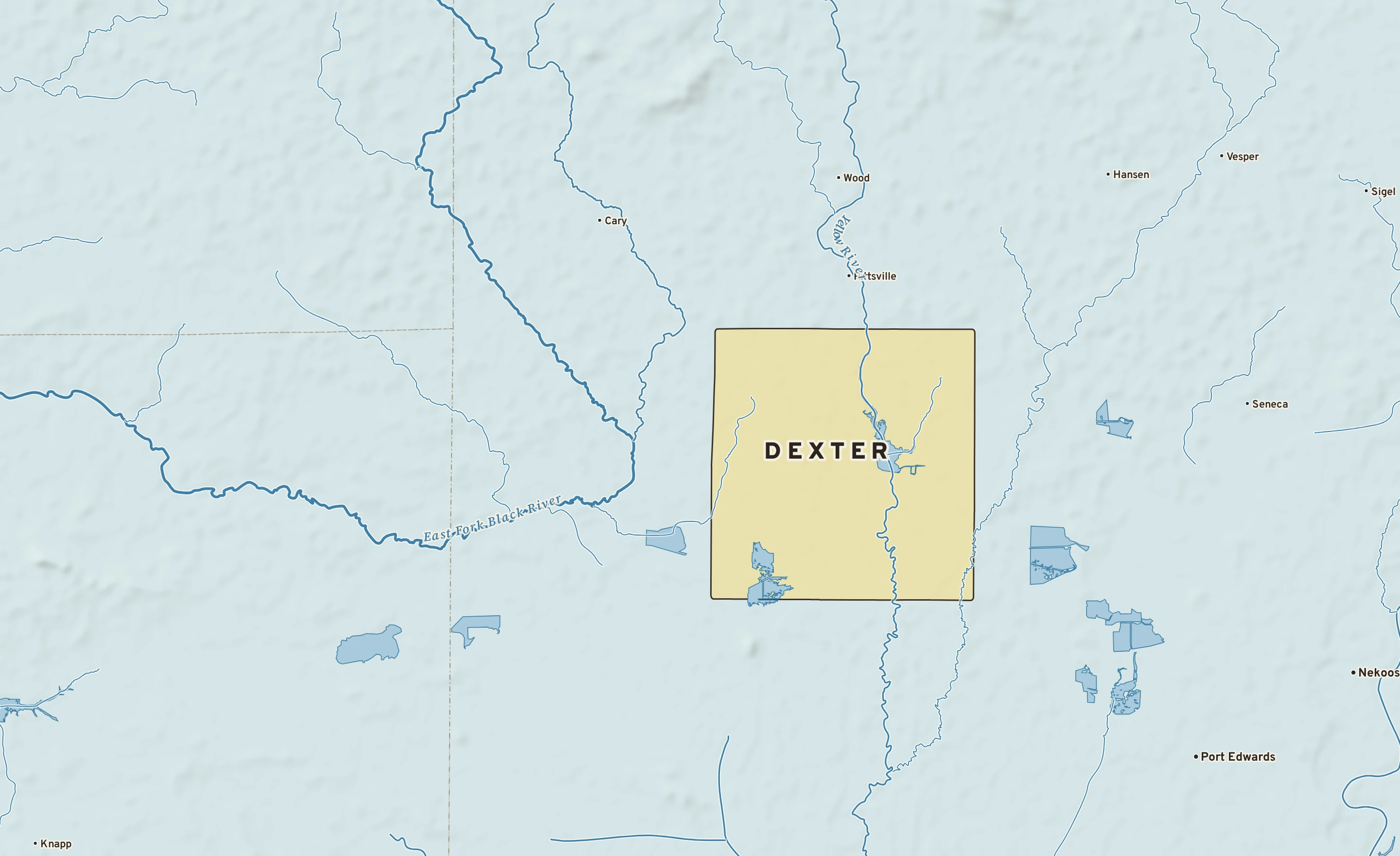 Shaded-relief atlas plate of Dexter, Wisconsin: rivers, roads, the city limits and where the water drains.