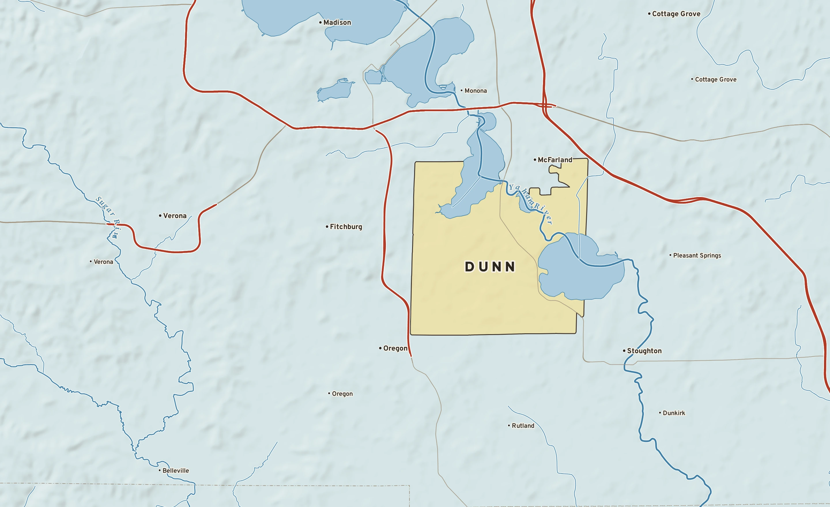 Shaded-relief atlas plate of Dunn, Wisconsin: rivers, roads, the city limits and where the water drains.