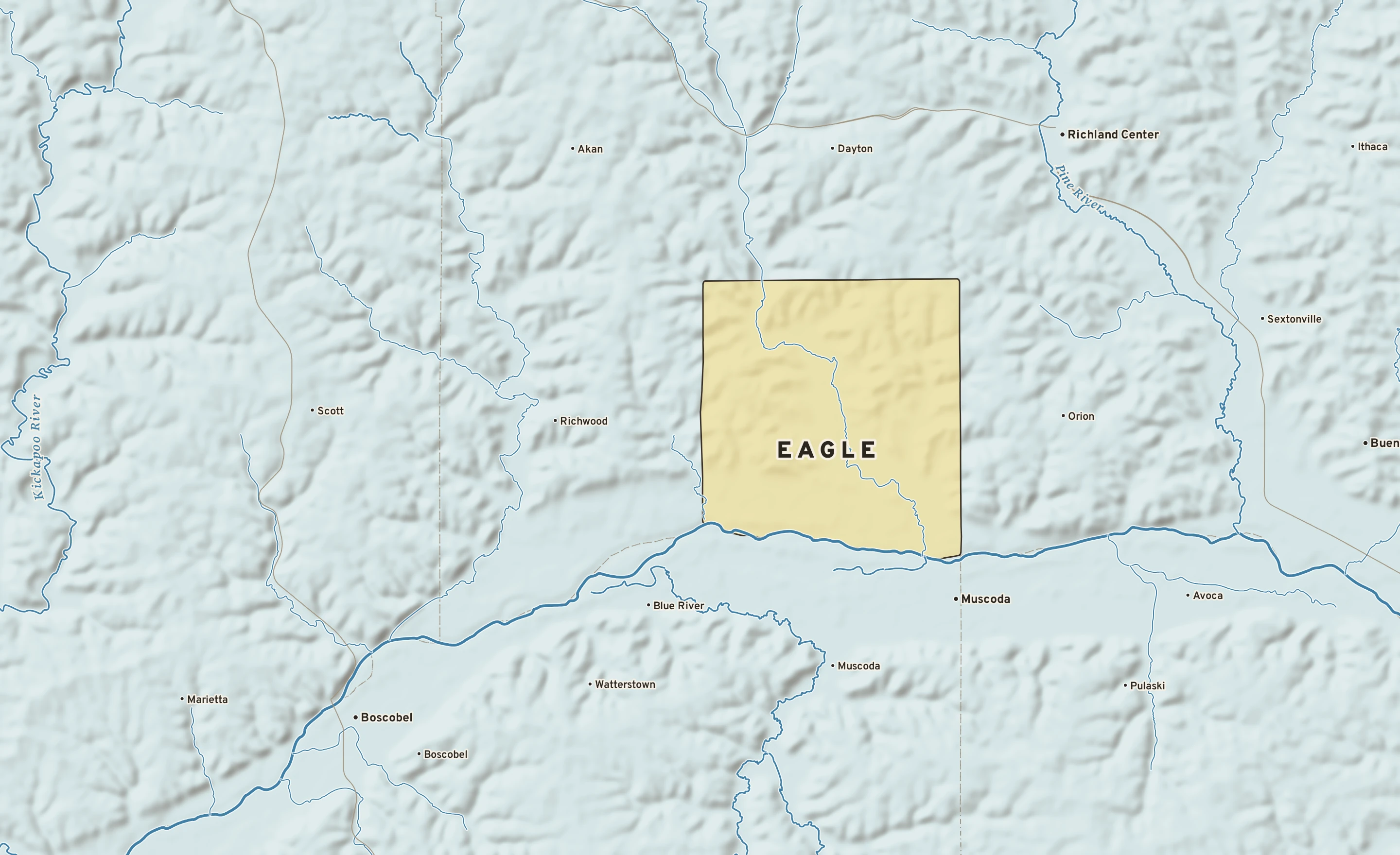 Shaded-relief atlas plate of Eagle, Wisconsin: rivers, roads, the city limits and where the water drains.