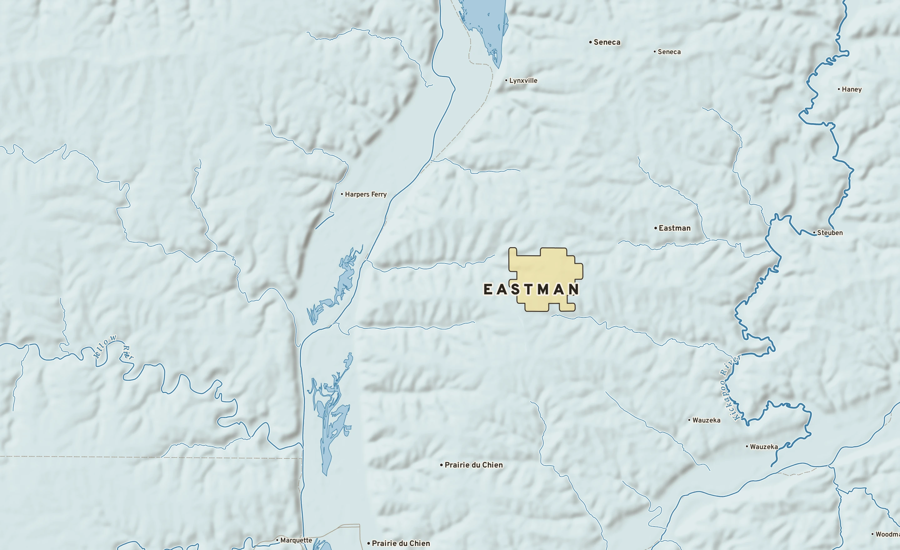 Shaded-relief atlas plate of Eastman, Wisconsin: rivers, roads, the city limits and where the water drains.