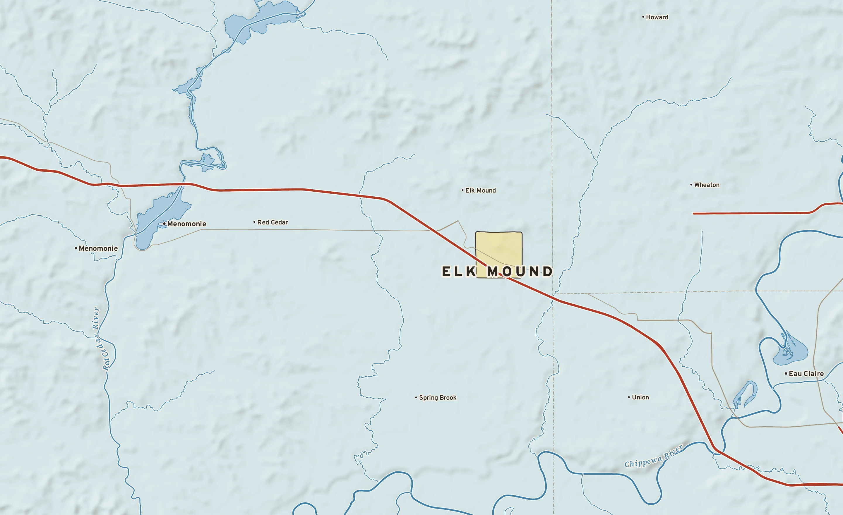 Shaded-relief atlas plate of Elk Mound, Wisconsin: rivers, roads, the city limits and where the water drains.