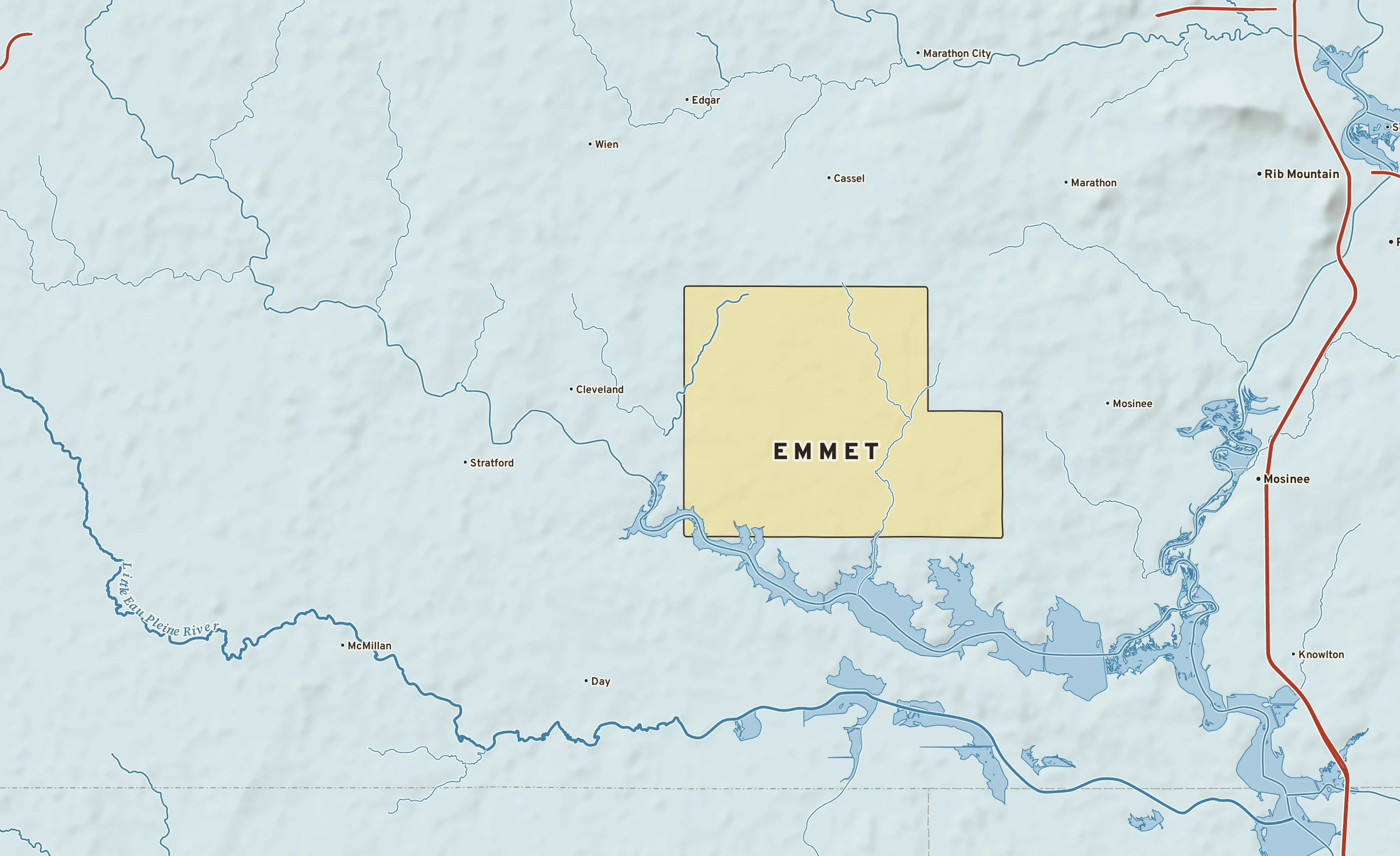 Shaded-relief atlas plate of Emmet, Wisconsin: rivers, roads, the city limits and where the water drains.