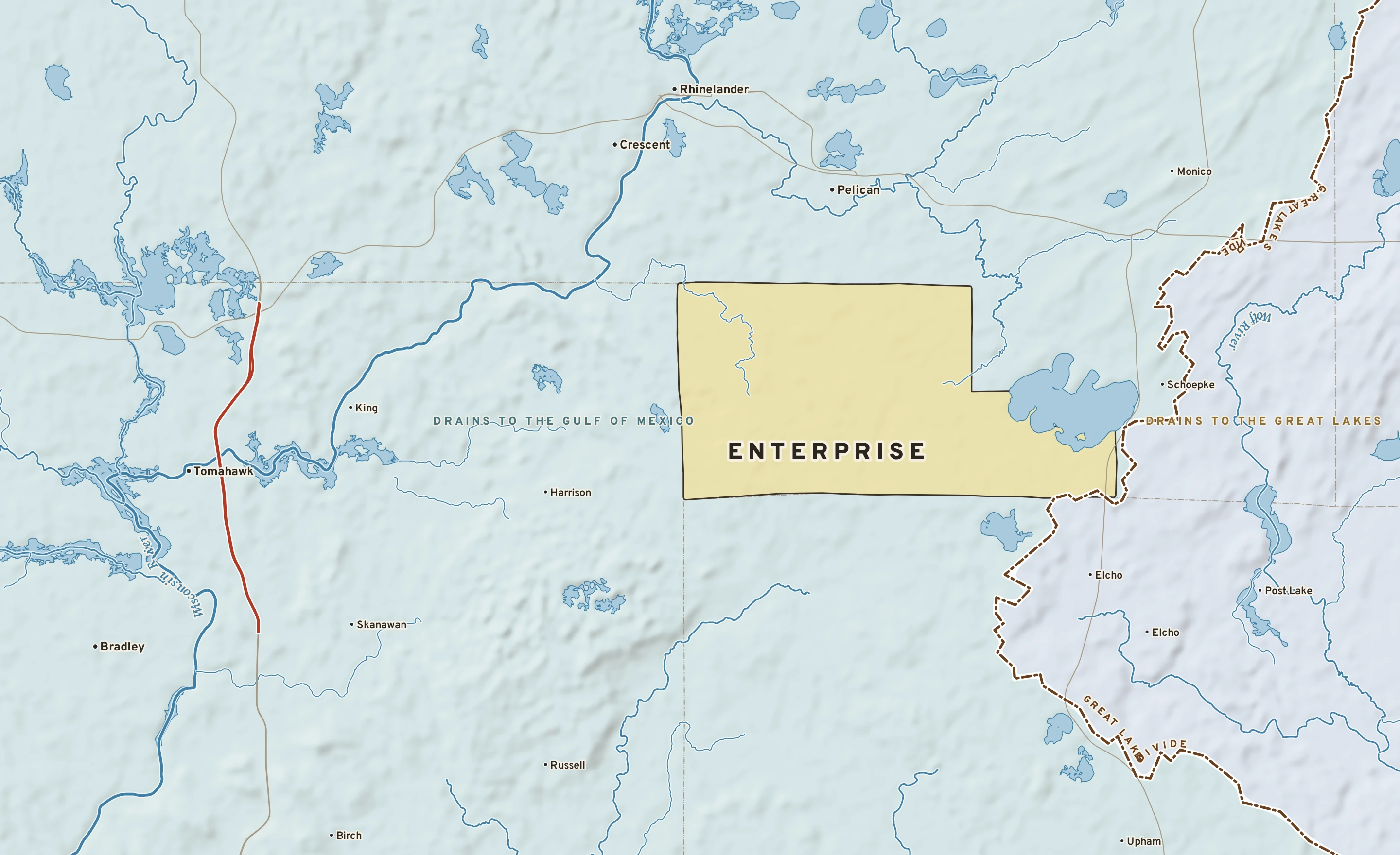 Shaded-relief atlas plate of Enterprise, Wisconsin: rivers, roads, the city limits and where the water drains.