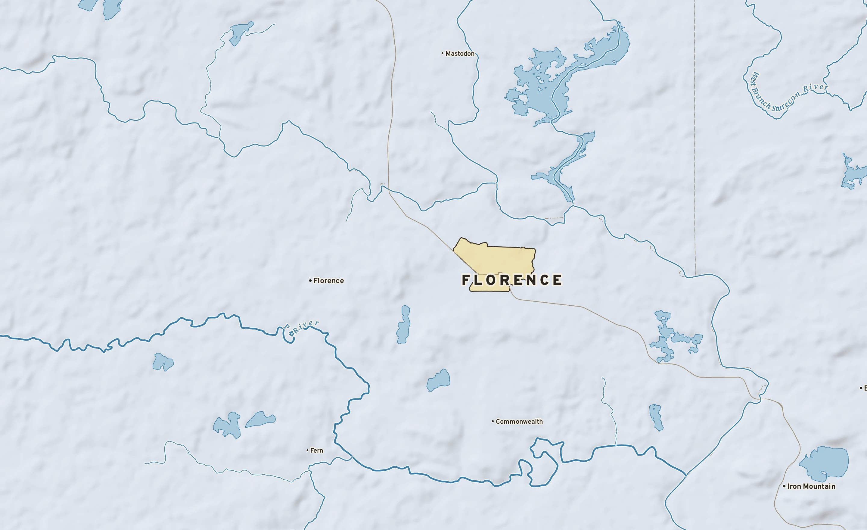 Shaded-relief atlas plate of Florence, Wisconsin: rivers, roads, the city limits and where the water drains.
