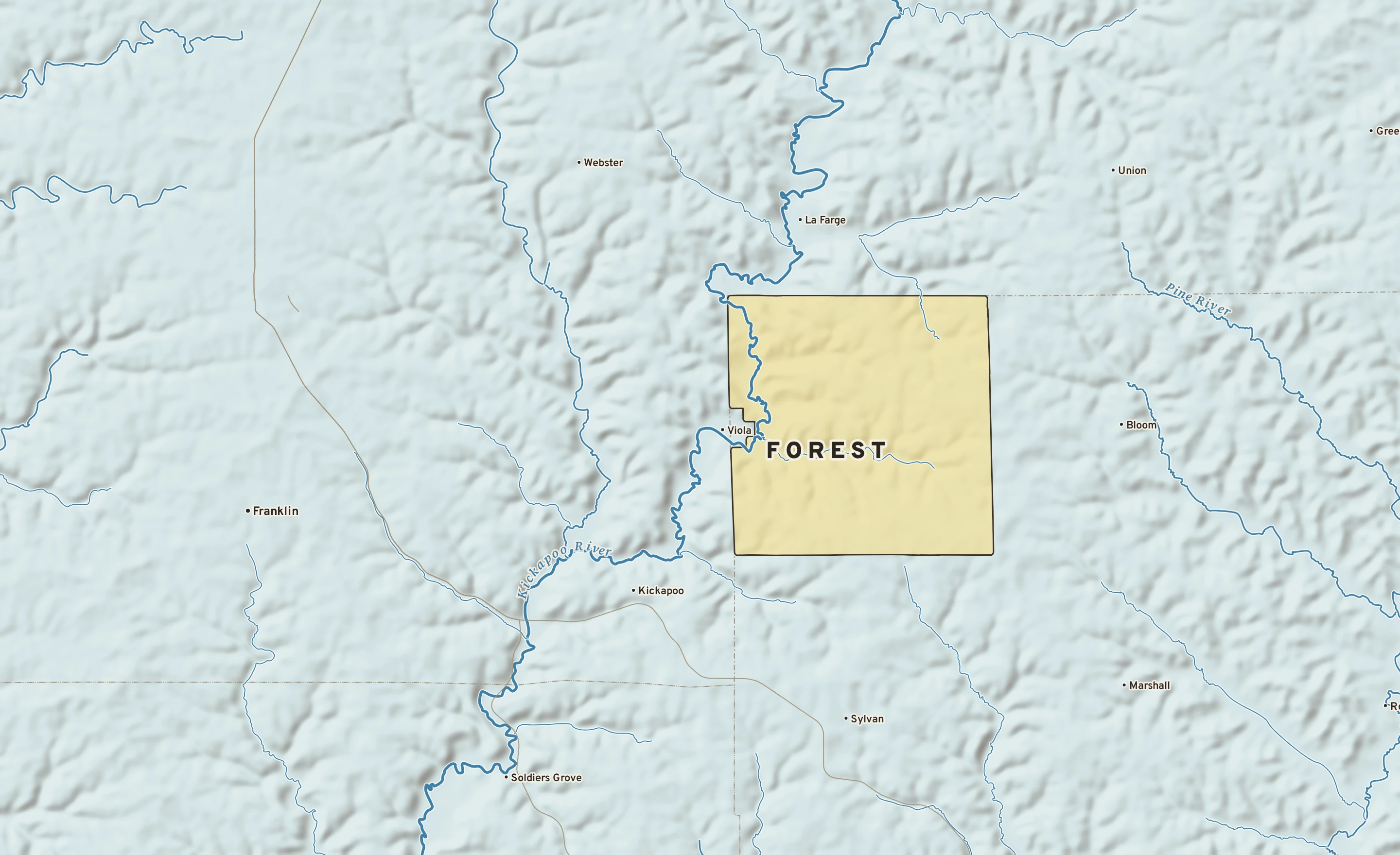 Shaded-relief atlas plate of Forest, Wisconsin: rivers, roads, the city limits and where the water drains.