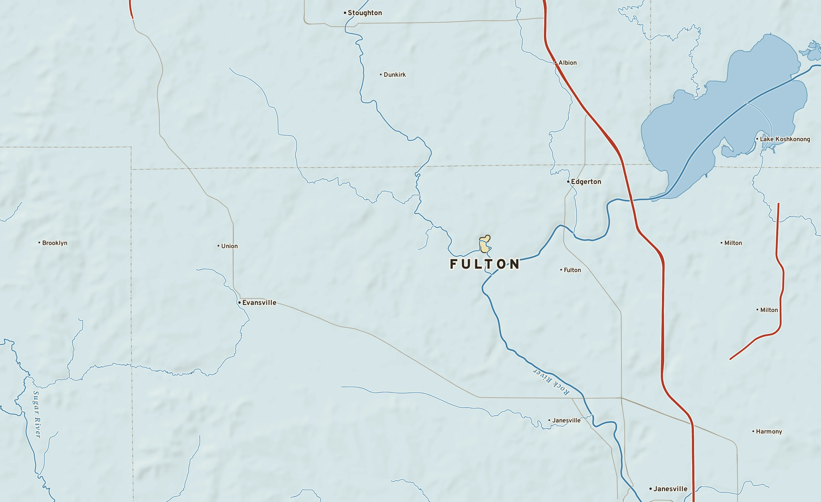 Shaded-relief atlas plate of Fulton, Wisconsin: rivers, roads, the city limits and where the water drains.
