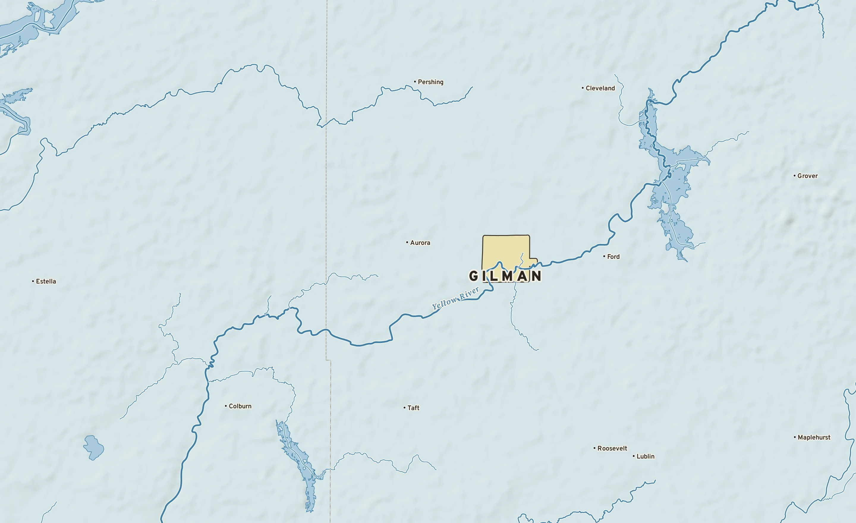 Shaded-relief atlas plate of Gilman, Wisconsin: rivers, roads, the city limits and where the water drains.