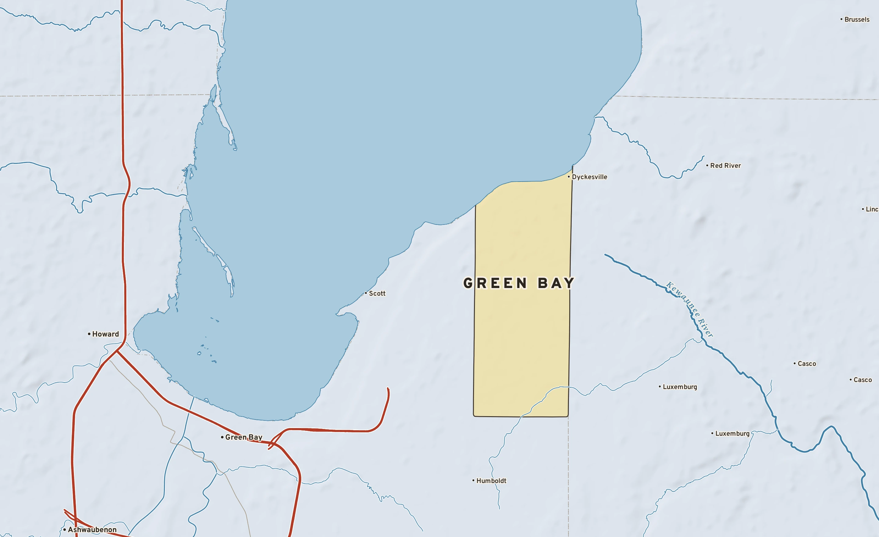 Shaded-relief atlas plate of Green Bay, Wisconsin: rivers, roads, the city limits and where the water drains.