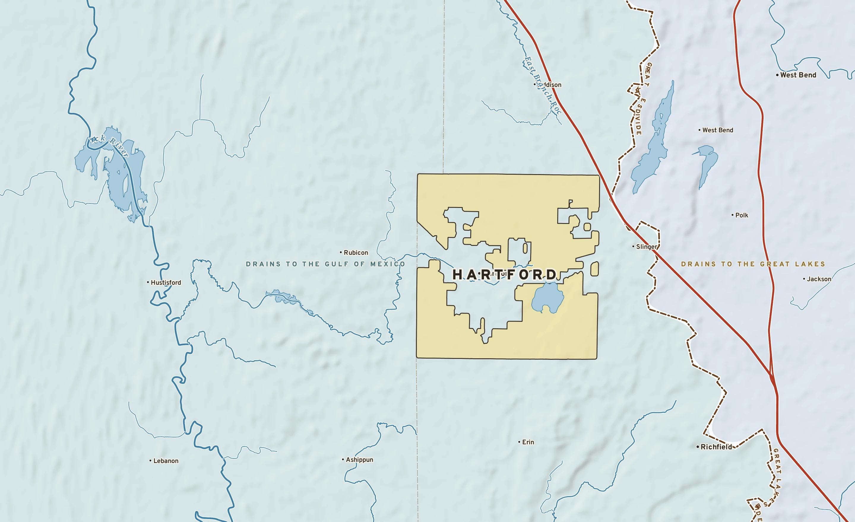 Shaded-relief atlas plate of Hartford, Wisconsin: rivers, roads, the city limits and where the water drains.