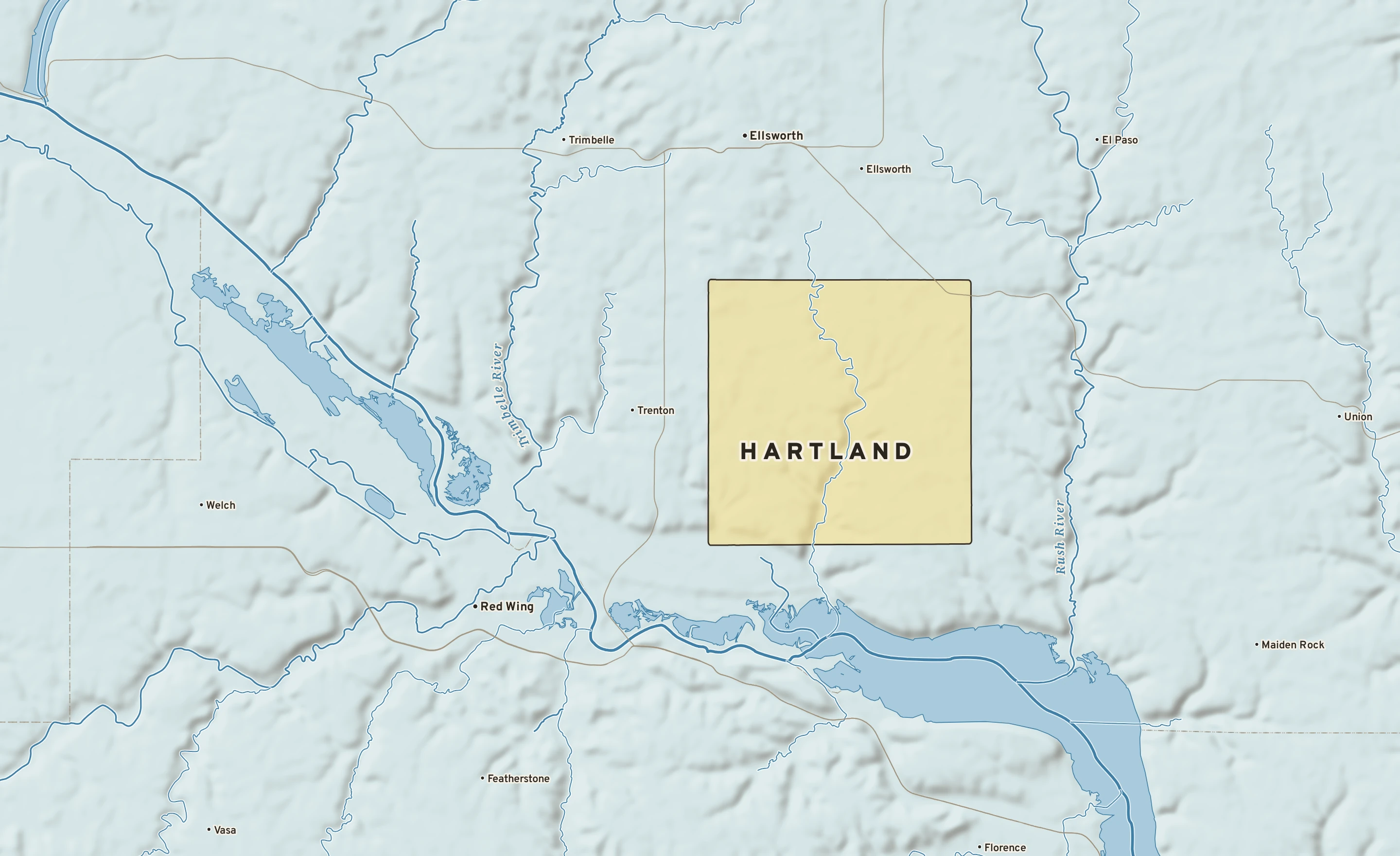 Shaded-relief atlas plate of Hartland, Wisconsin: rivers, roads, the city limits and where the water drains.