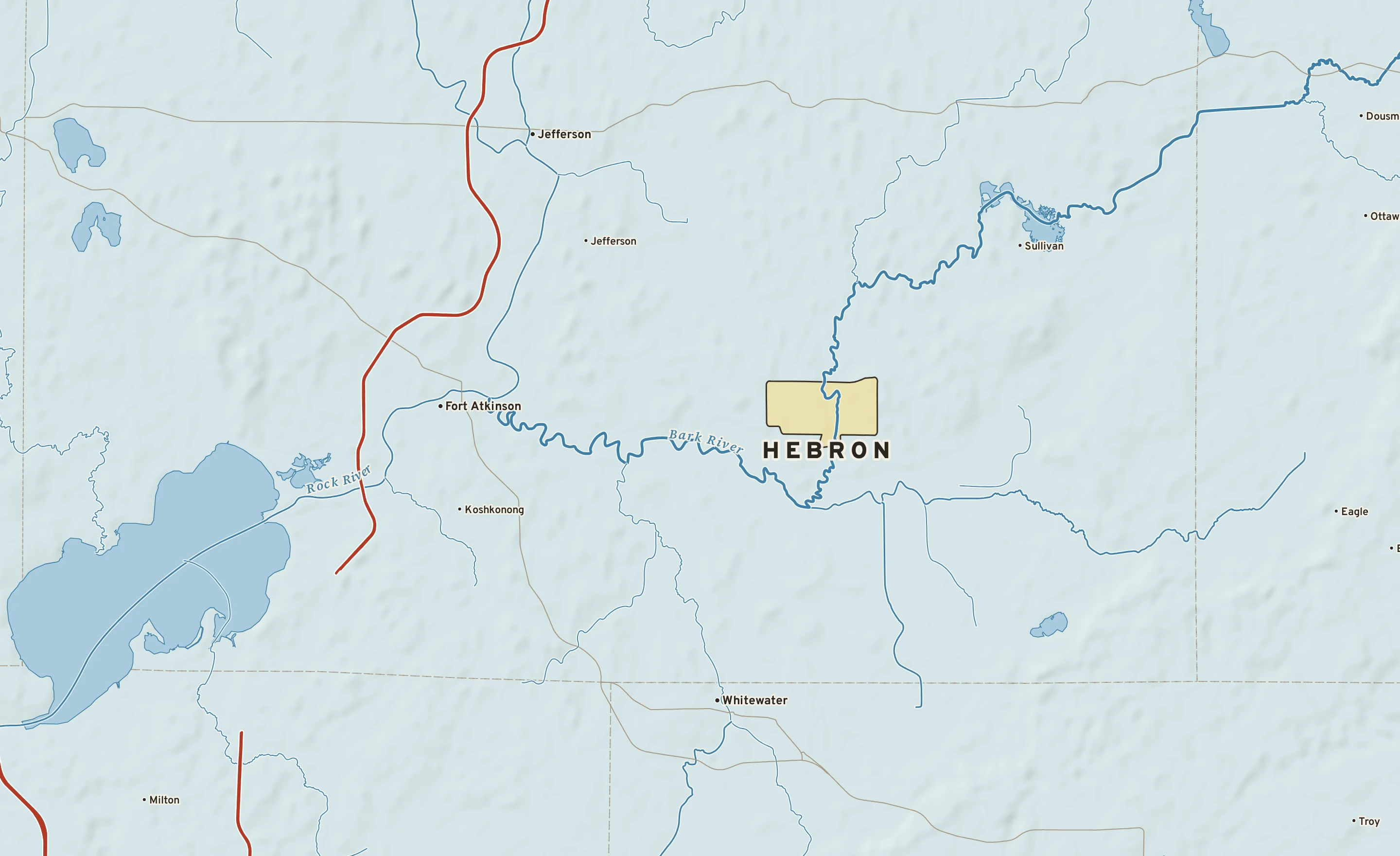 Shaded-relief atlas plate of Hebron, Wisconsin: rivers, roads, the city limits and where the water drains.