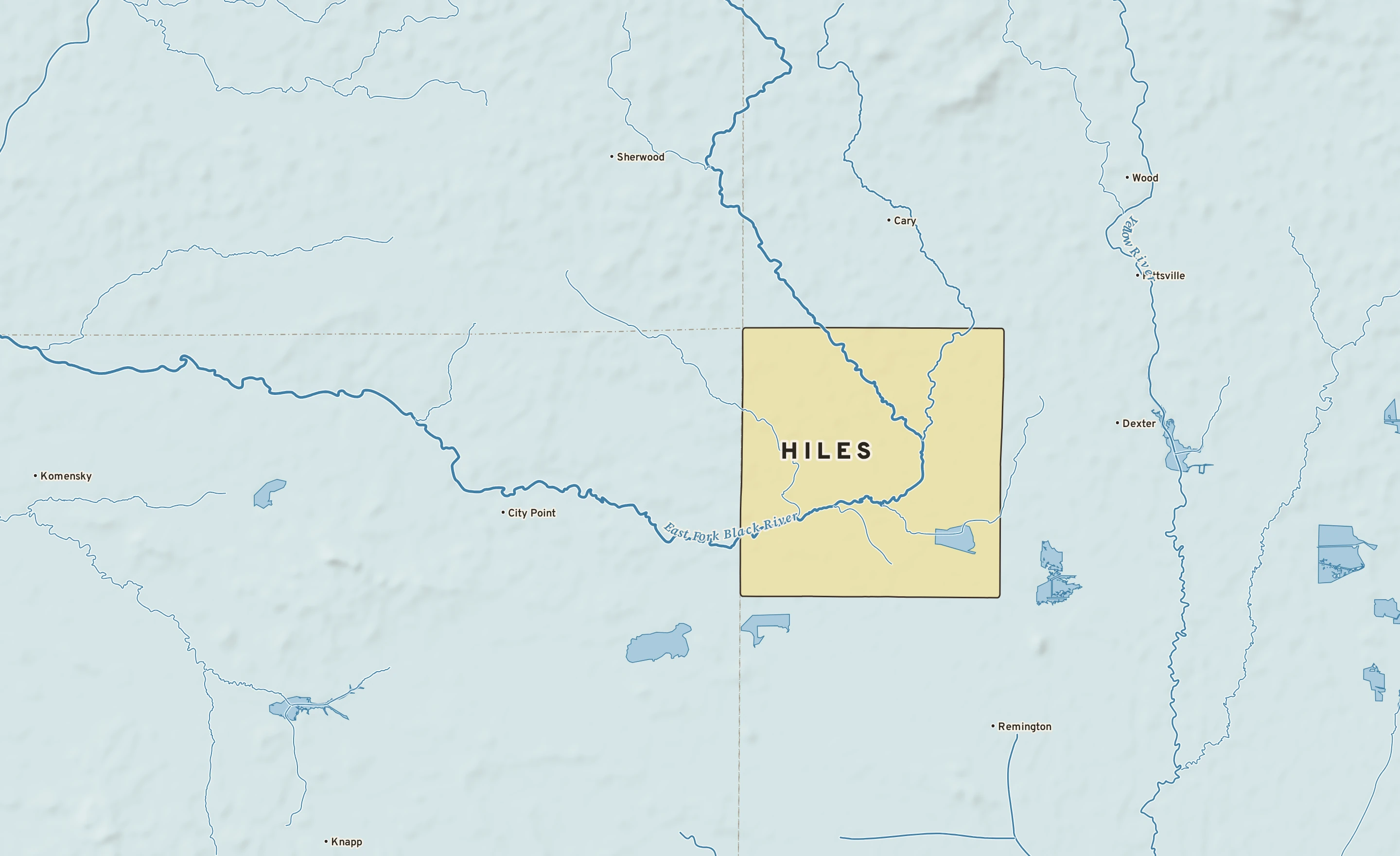 Shaded-relief atlas plate of Hiles, Wisconsin: rivers, roads, the city limits and where the water drains.