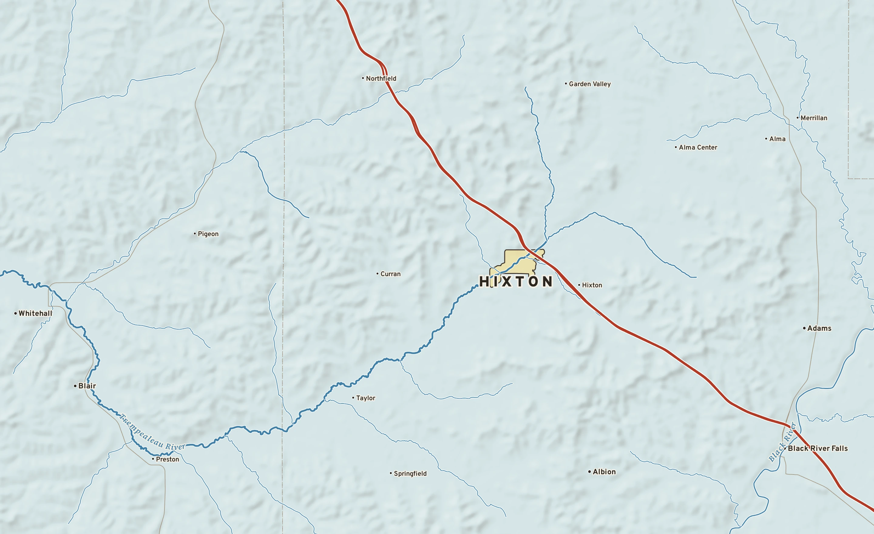 Shaded-relief atlas plate of Hixton, Wisconsin: rivers, roads, the city limits and where the water drains.