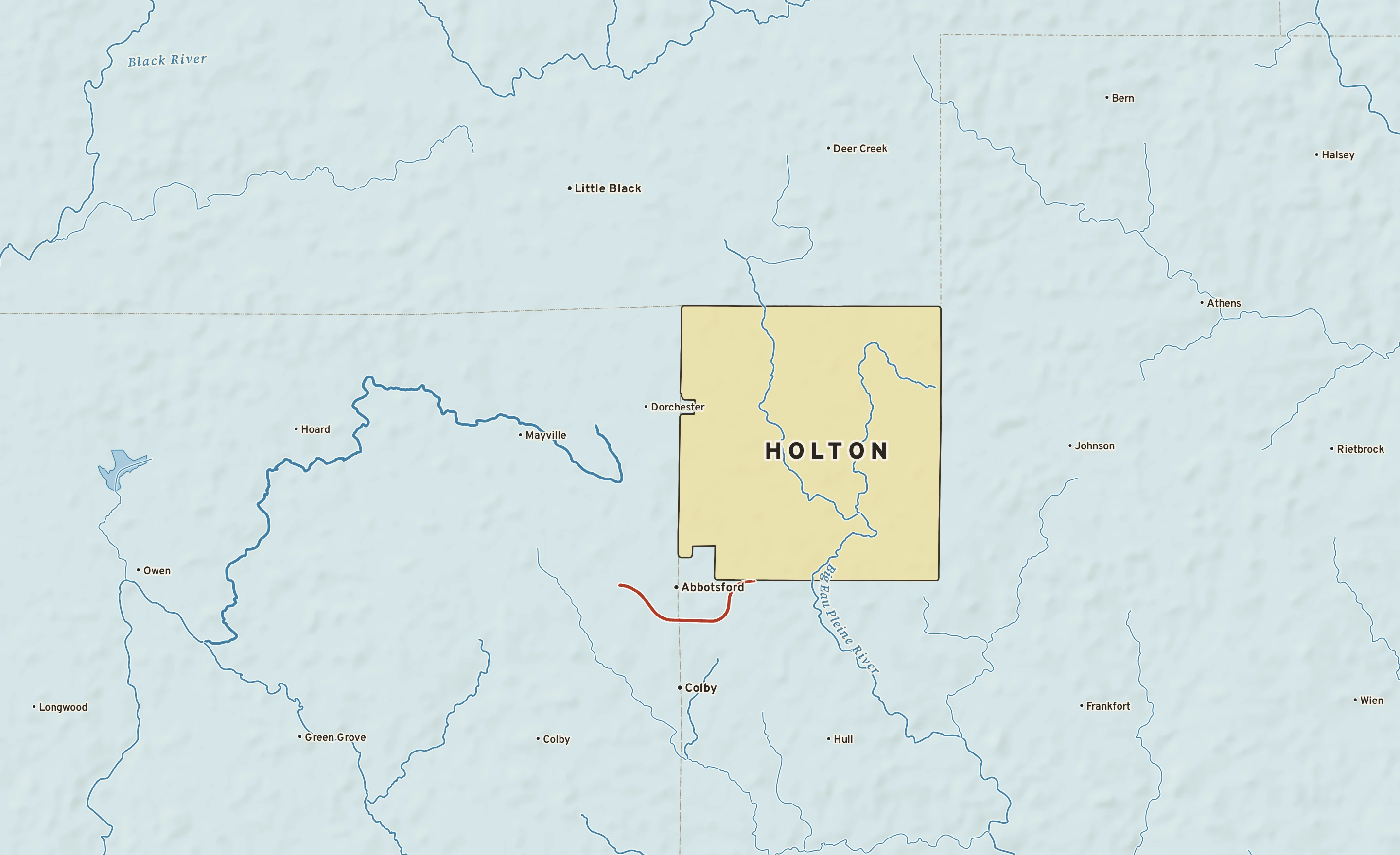 Shaded-relief atlas plate of Holton, Wisconsin: rivers, roads, the city limits and where the water drains.