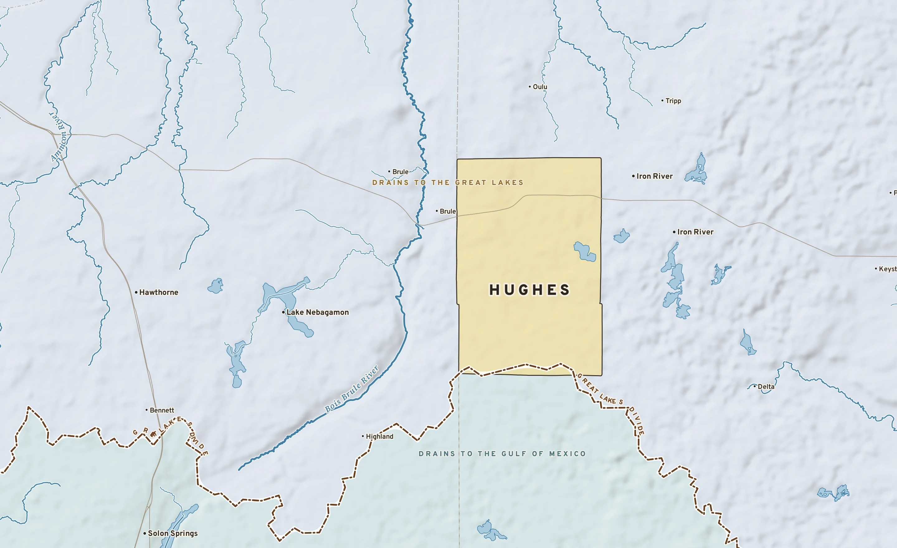 Shaded-relief atlas plate of Hughes, Wisconsin: rivers, roads, the city limits and where the water drains.