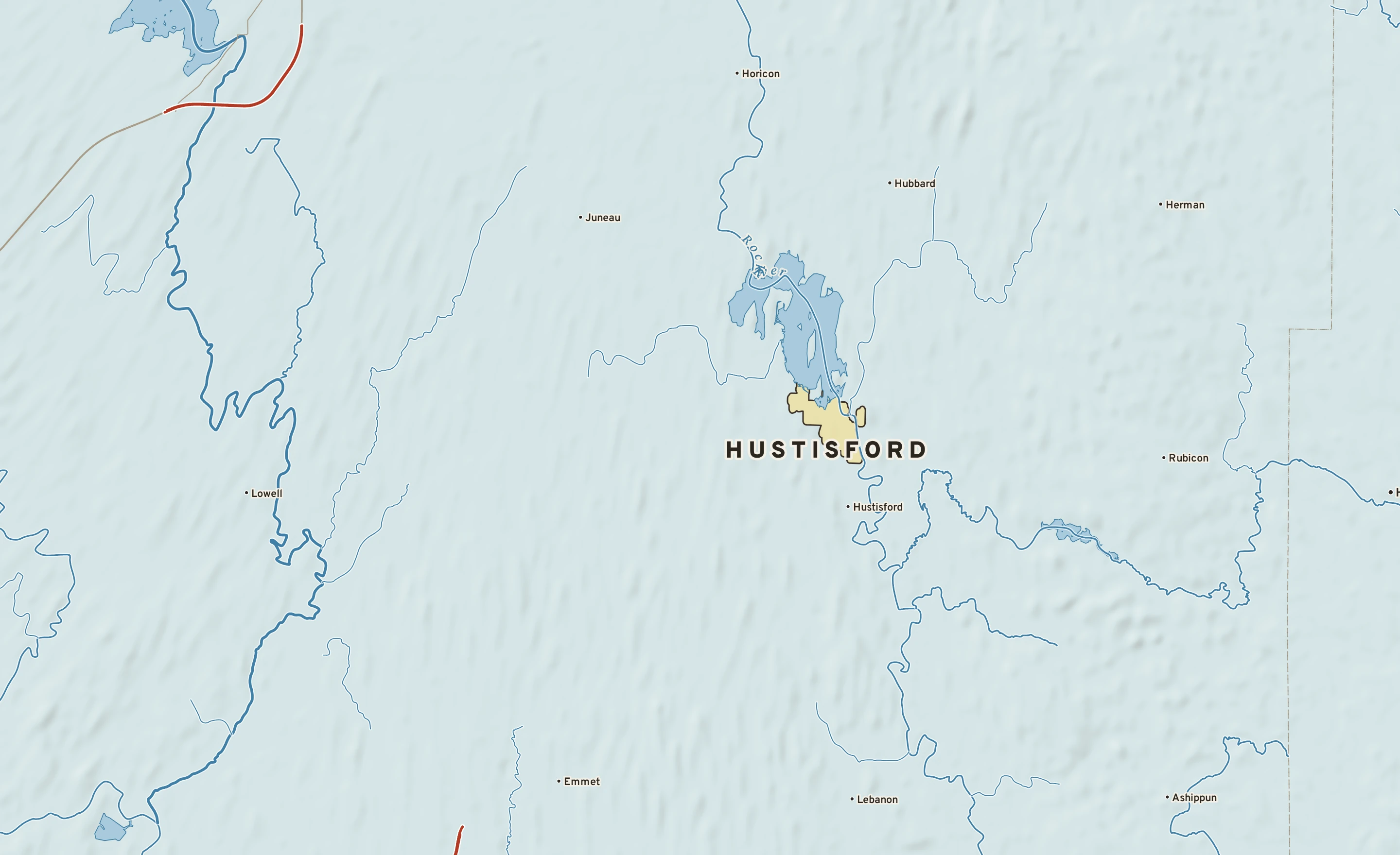 Shaded-relief atlas plate of Hustisford, Wisconsin: rivers, roads, the city limits and where the water drains.