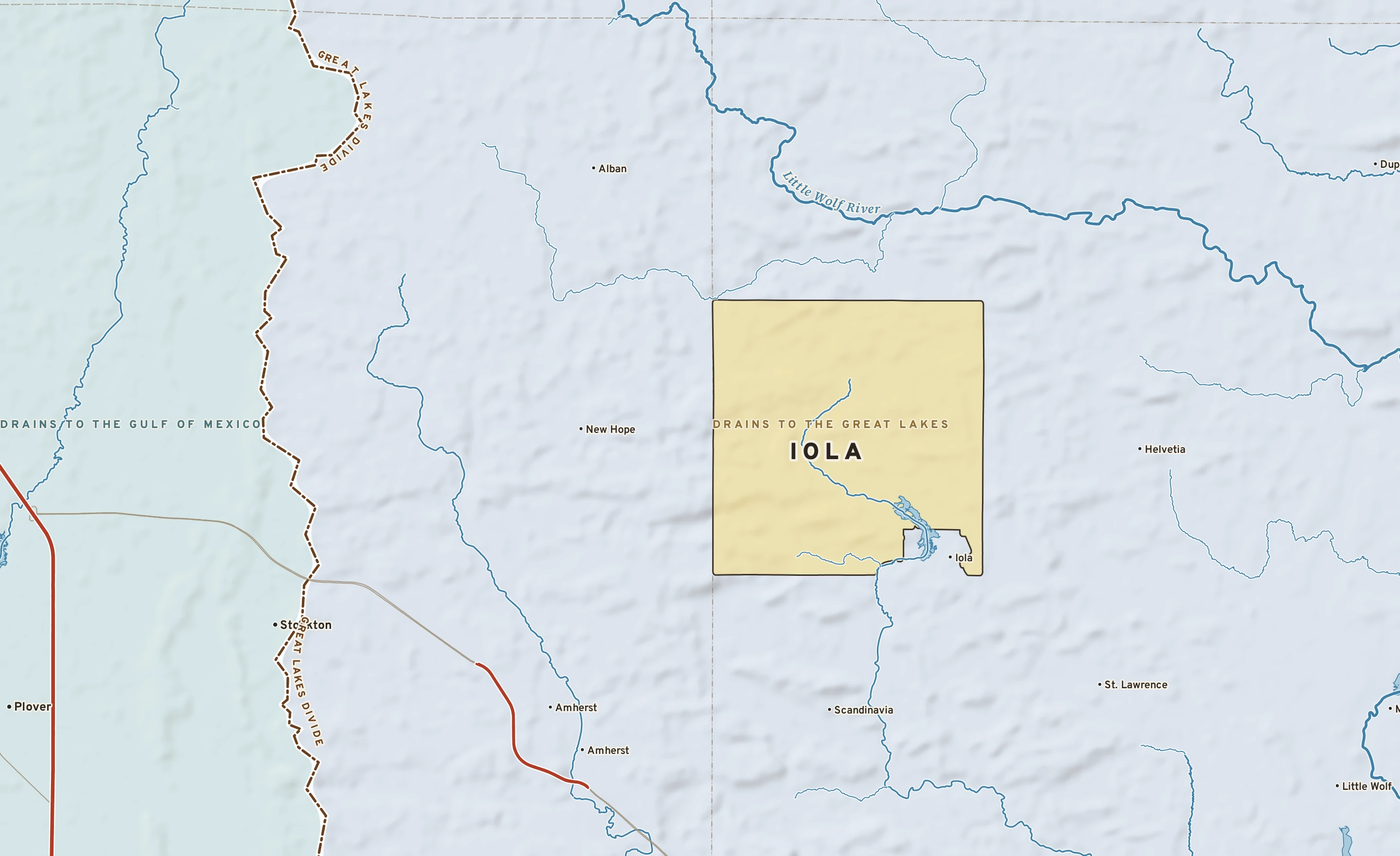 Shaded-relief atlas plate of Iola, Wisconsin: rivers, roads, the city limits and where the water drains.