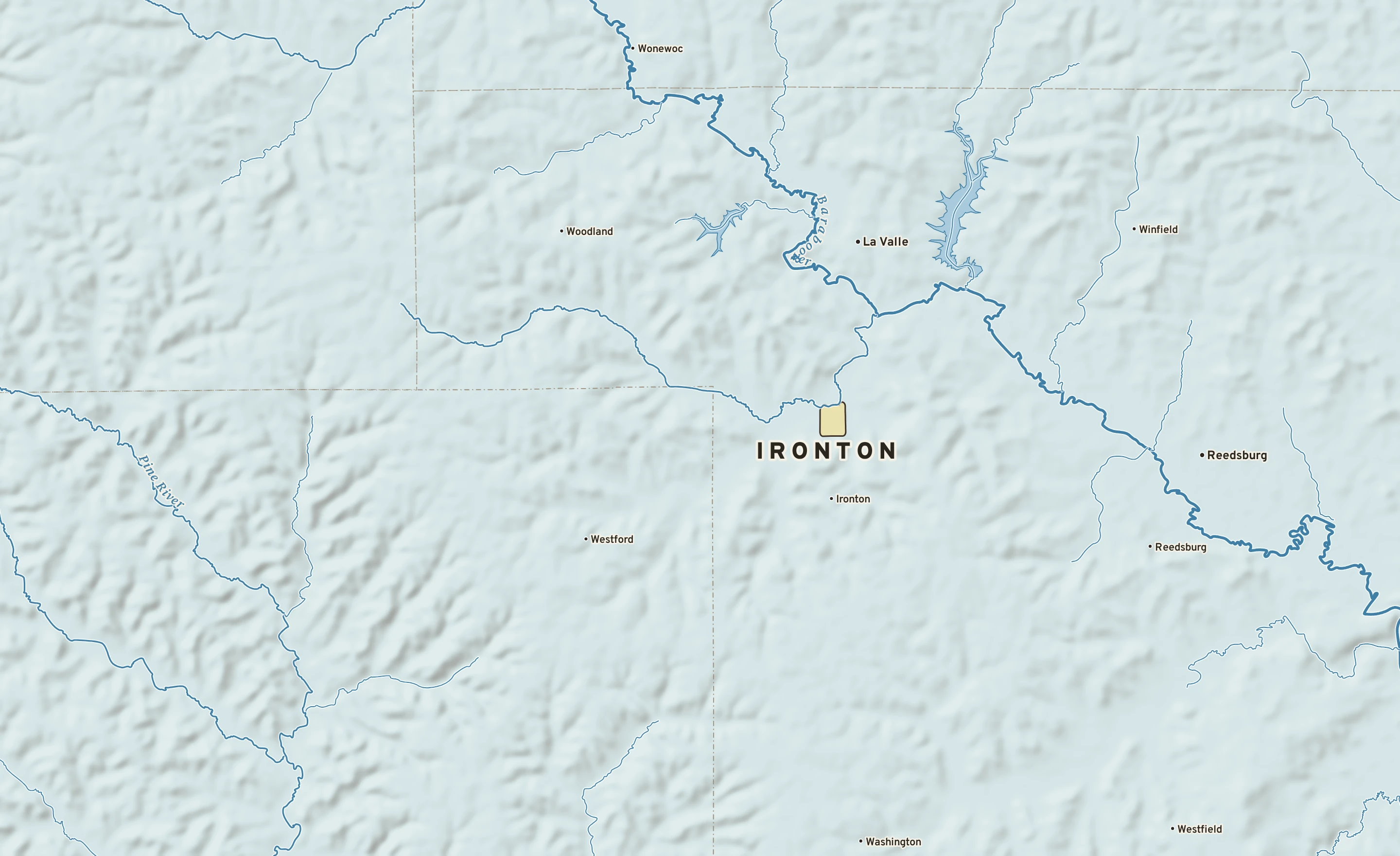Shaded-relief atlas plate of Ironton, Wisconsin: rivers, roads, the city limits and where the water drains.