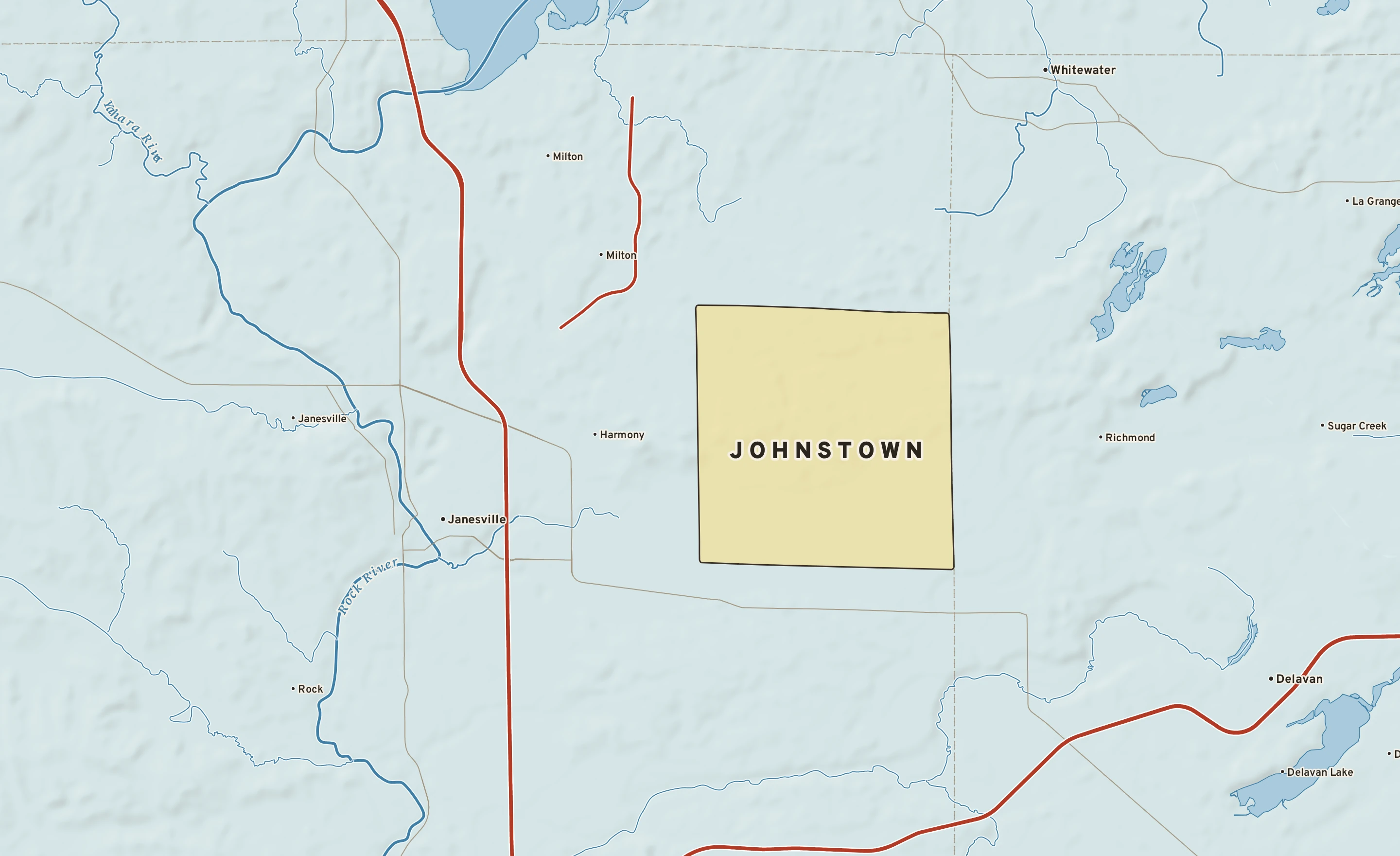 Shaded-relief atlas plate of Johnstown, Wisconsin: rivers, roads, the city limits and where the water drains.